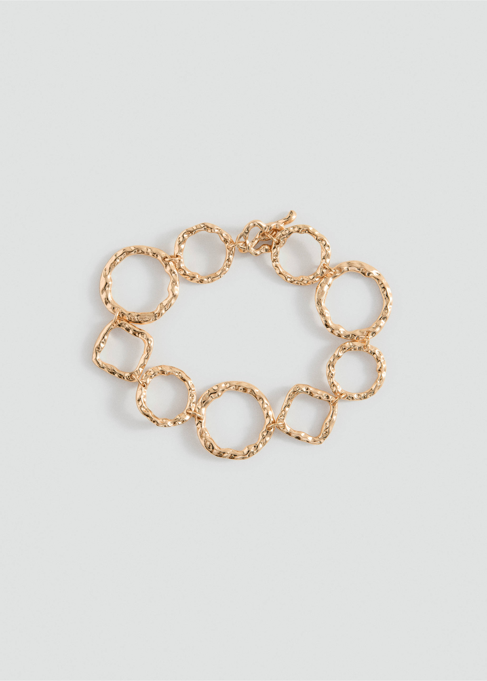 Gold-toned link bracelet with textured circular and square charms., Gold. Ref: 37055181-00.
