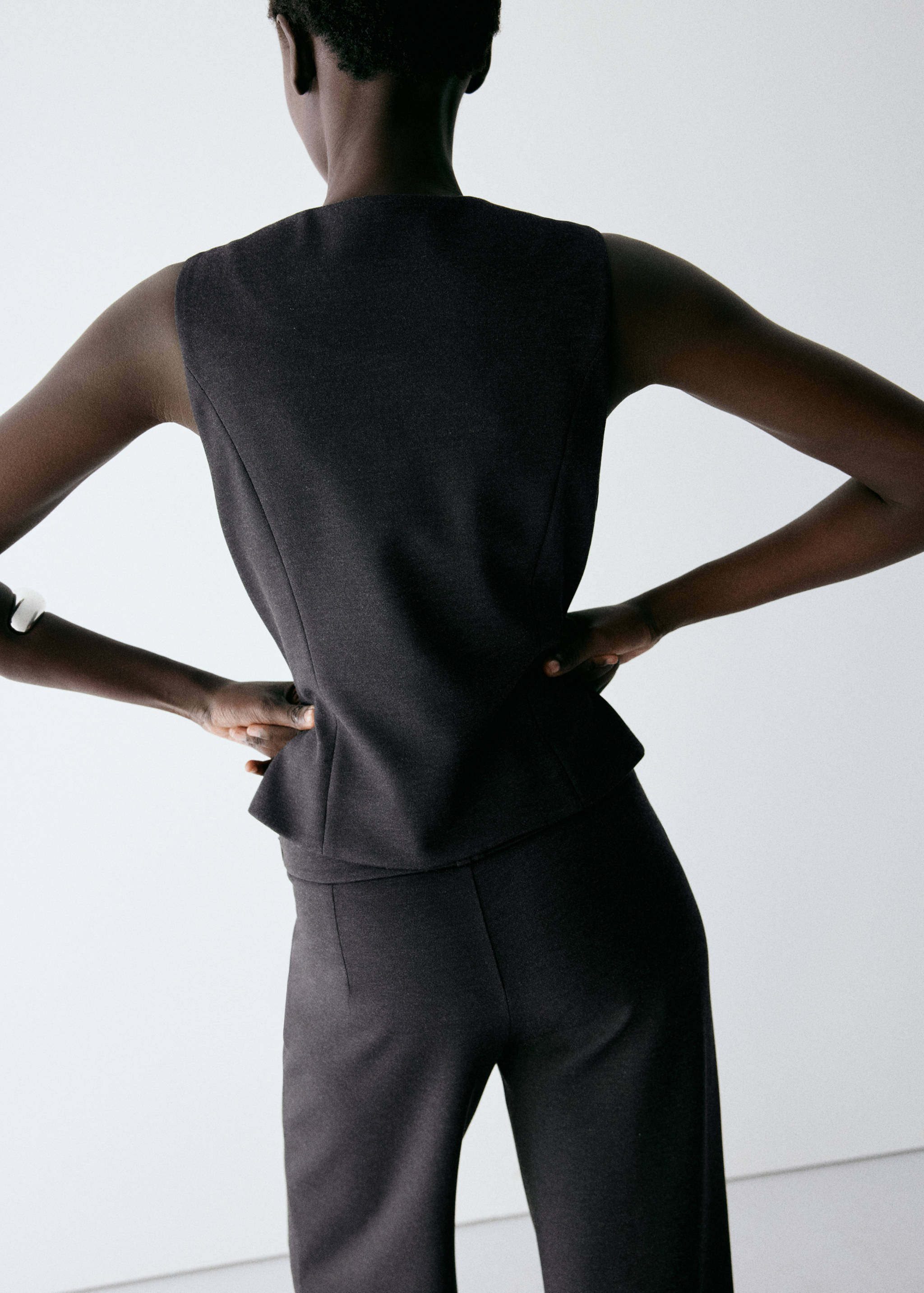 Waistcoat with frogging detail and seam detailing - Reverse of the article