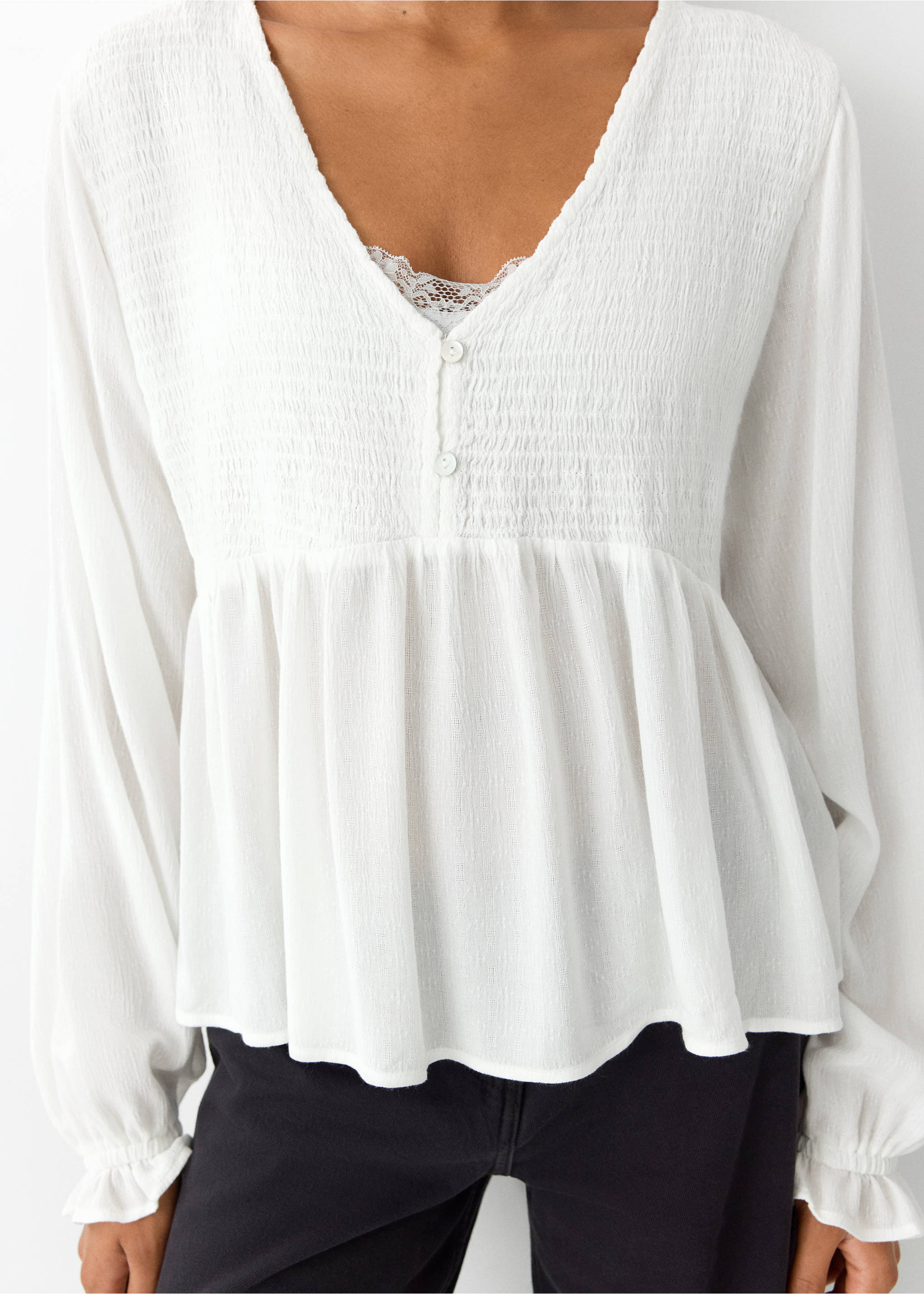 White long-sleeve V-neck blouse with a smocked bodice and button placket., Off White. Ref: 37055987-00.