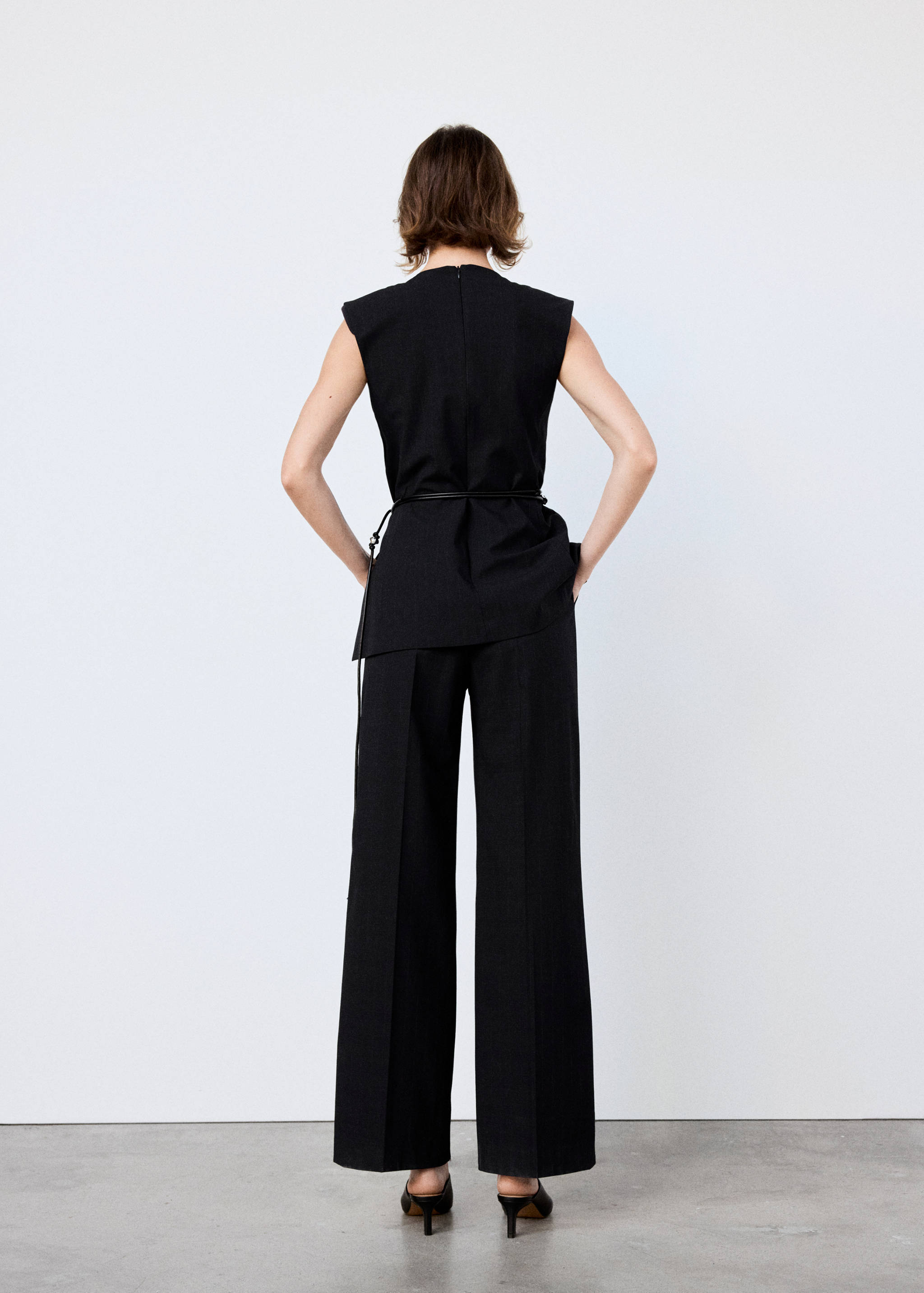 Combined jumpsuit with beaded belt - Reverse of the article