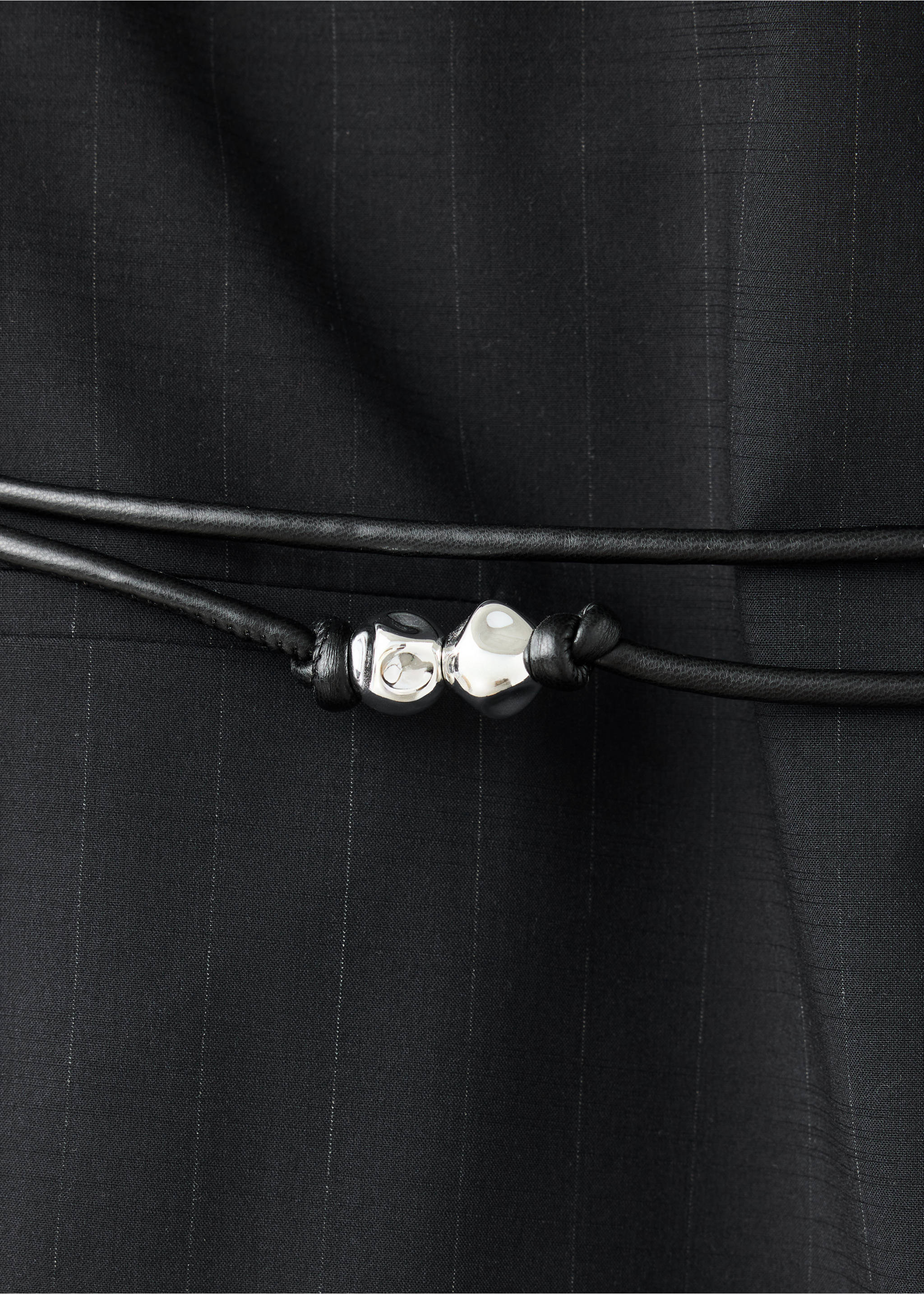 Combined jumpsuit with beaded belt - Details of the article 8, Black. Ref: 37055994-00.