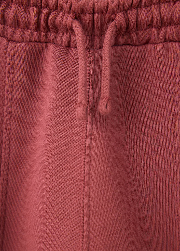Jogger trousers with seam detail — Maroon