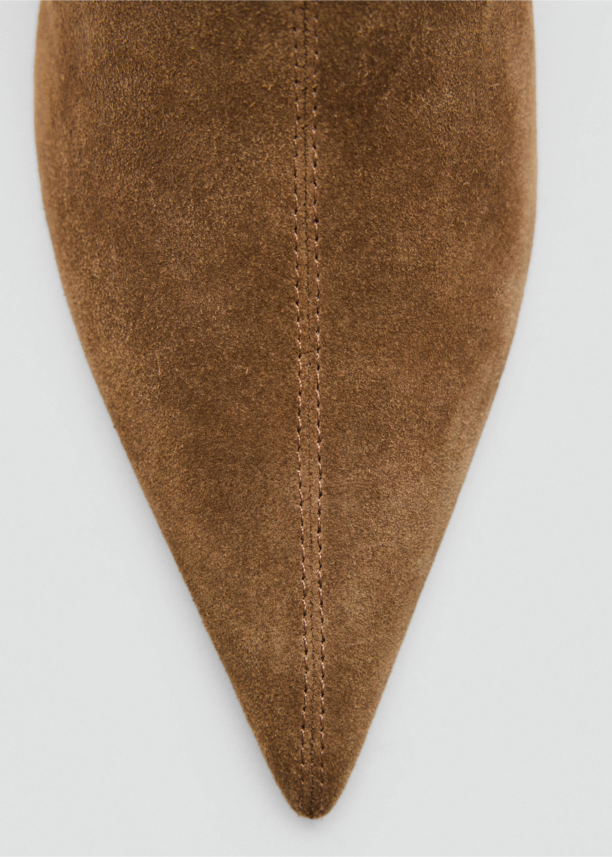 Close-up of the pointed toe of a brown suede ankle boot., Medium Brown. Ref: 37056342-00.