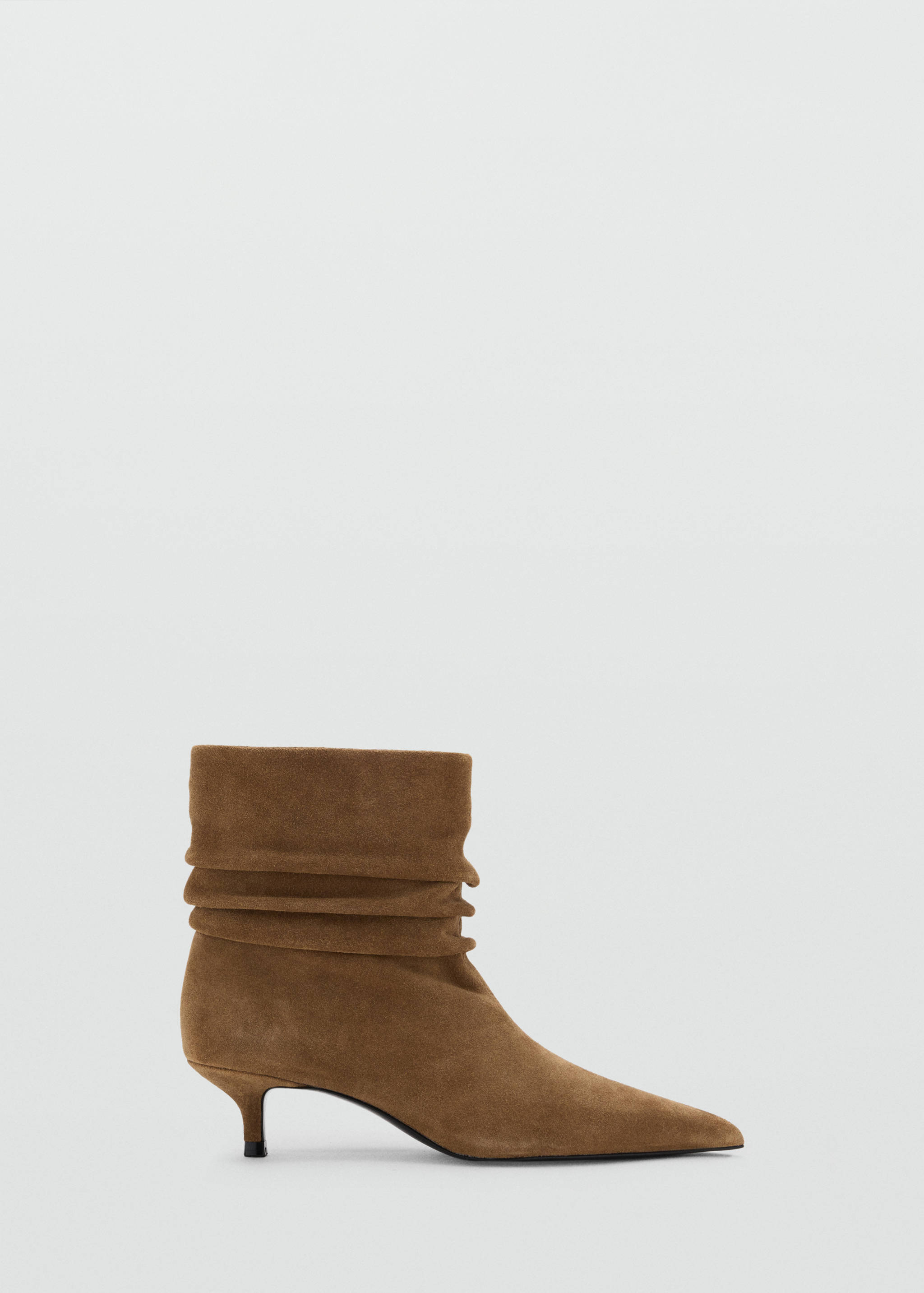 Brown suede ankle boot with a pointed toe, slouchy shaft, and kitten heel.