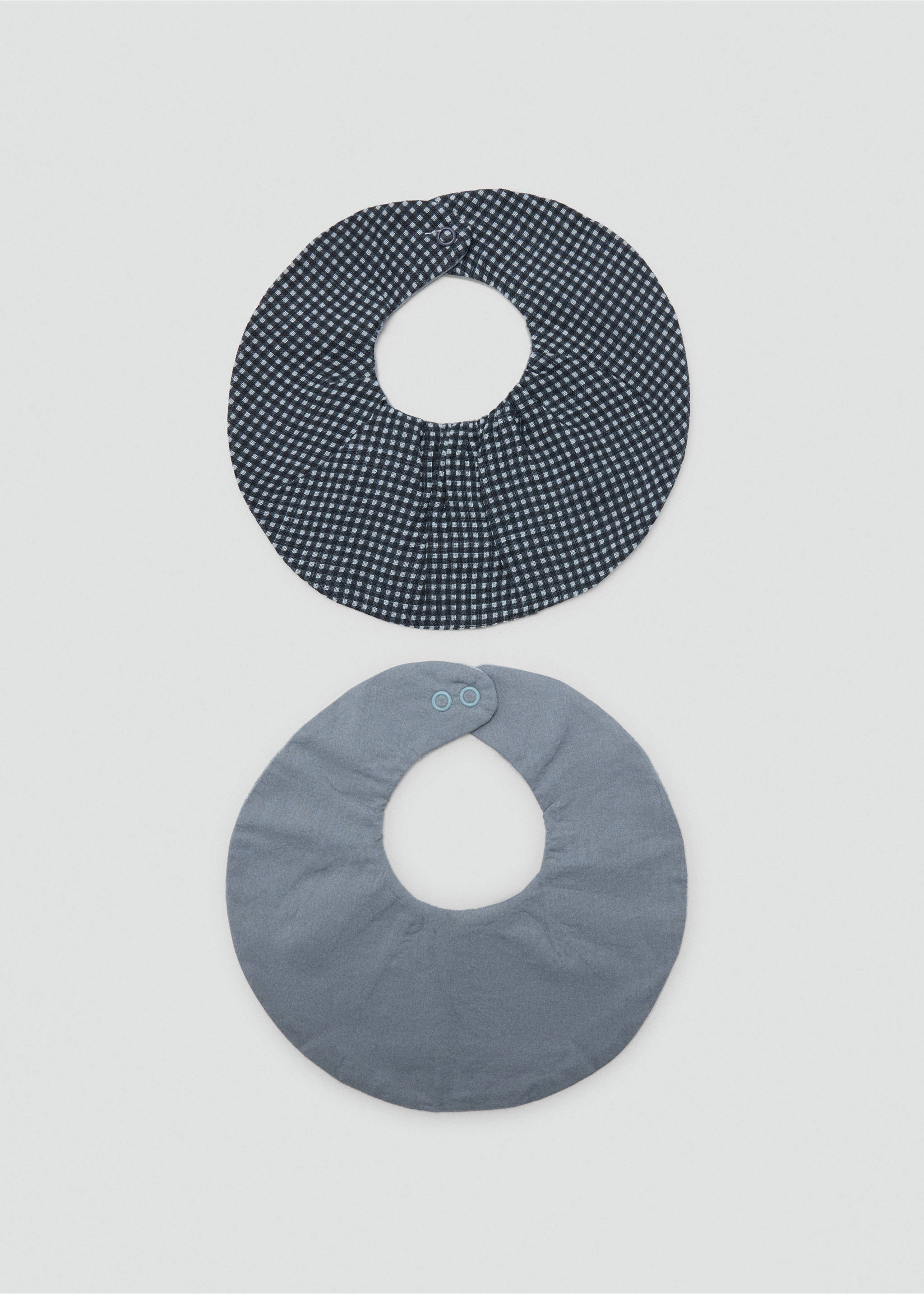 Set of two matching bibs - Article without model, Petrol Blue. Ref: 37056345-00.