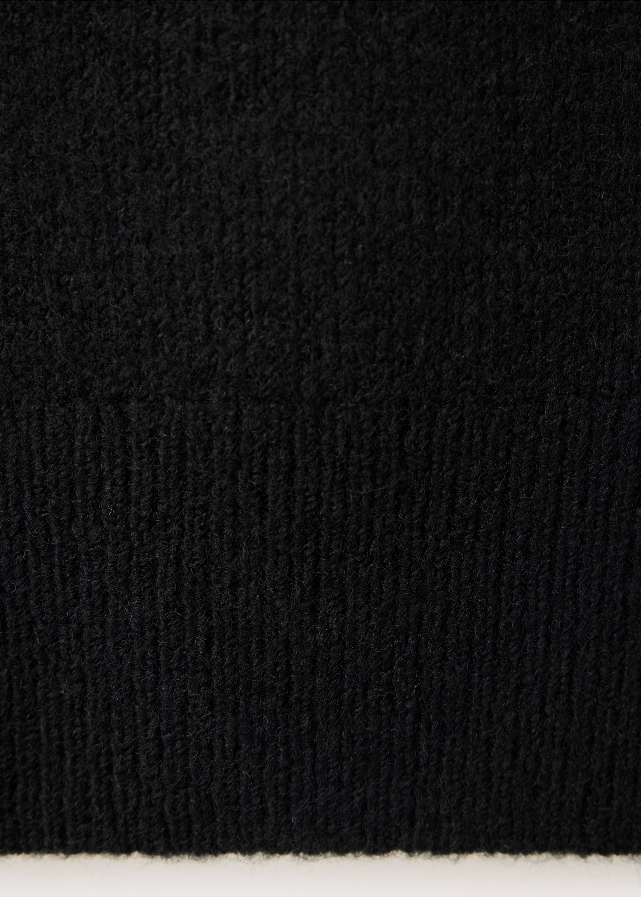 Asymmetrical eyelet jumper - Details of the article 0, Black. Ref: 37056734-00.