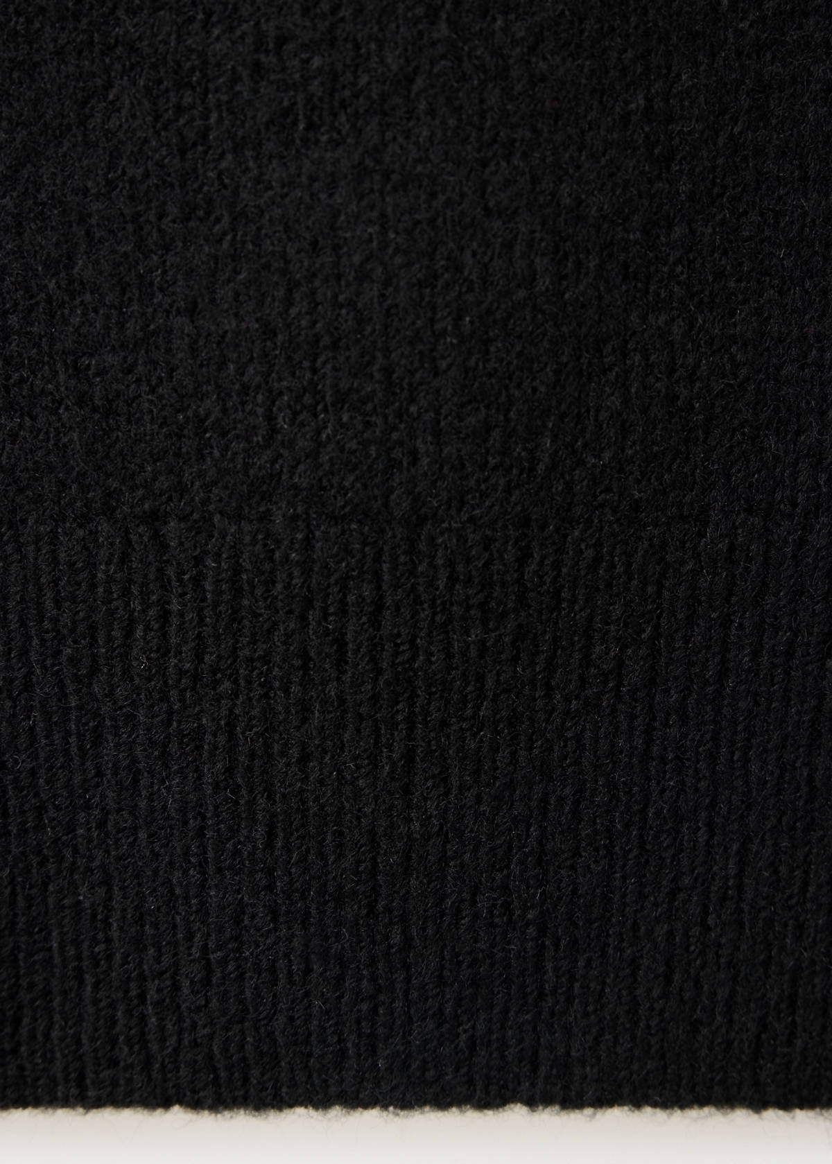 Asymmetric eyelet jersey — Black