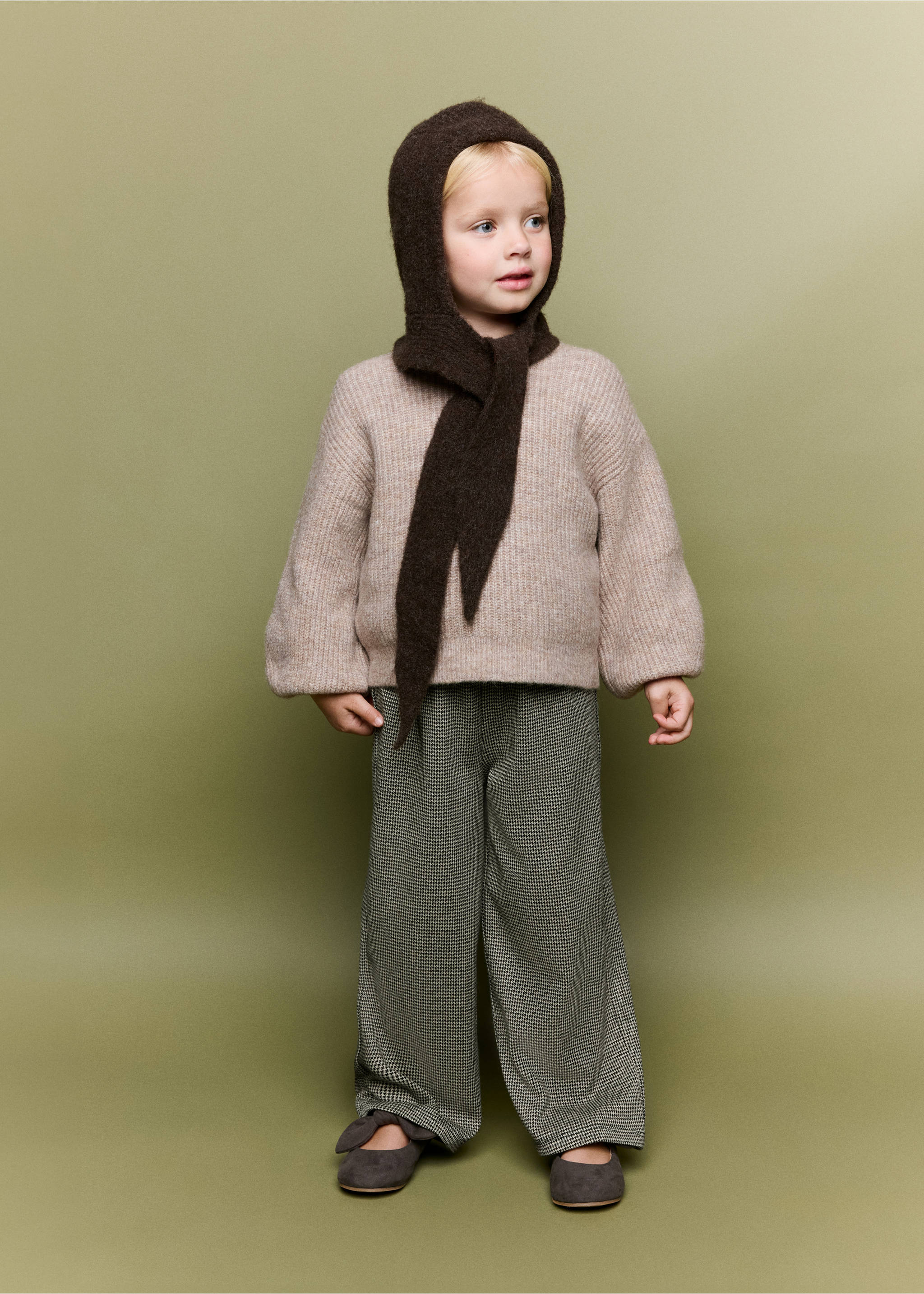 Green houndstooth trousers styled with a beige sweater and dark brown balaclava., Brown. Ref: 37056736-00.