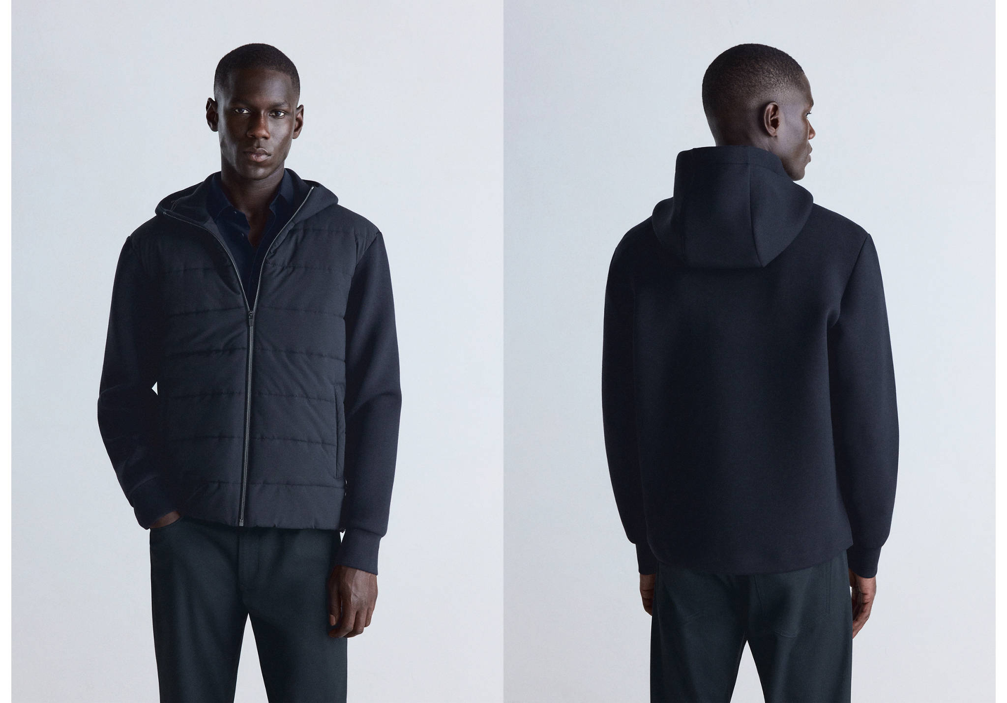 Black zipped hoodie sweatshirt with a quilted front panel and smooth sleeves, shown from front and back.