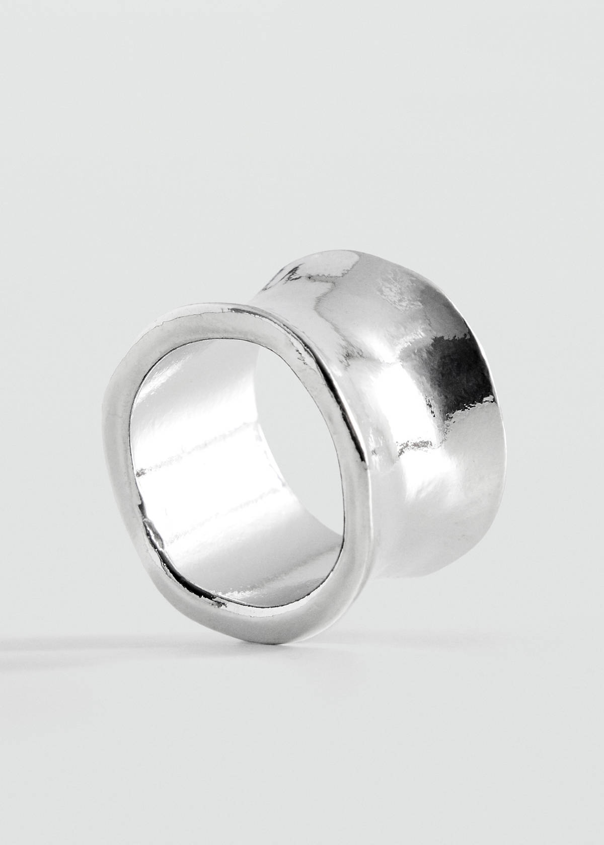 Wide metal ring with an irregular finish — Silver