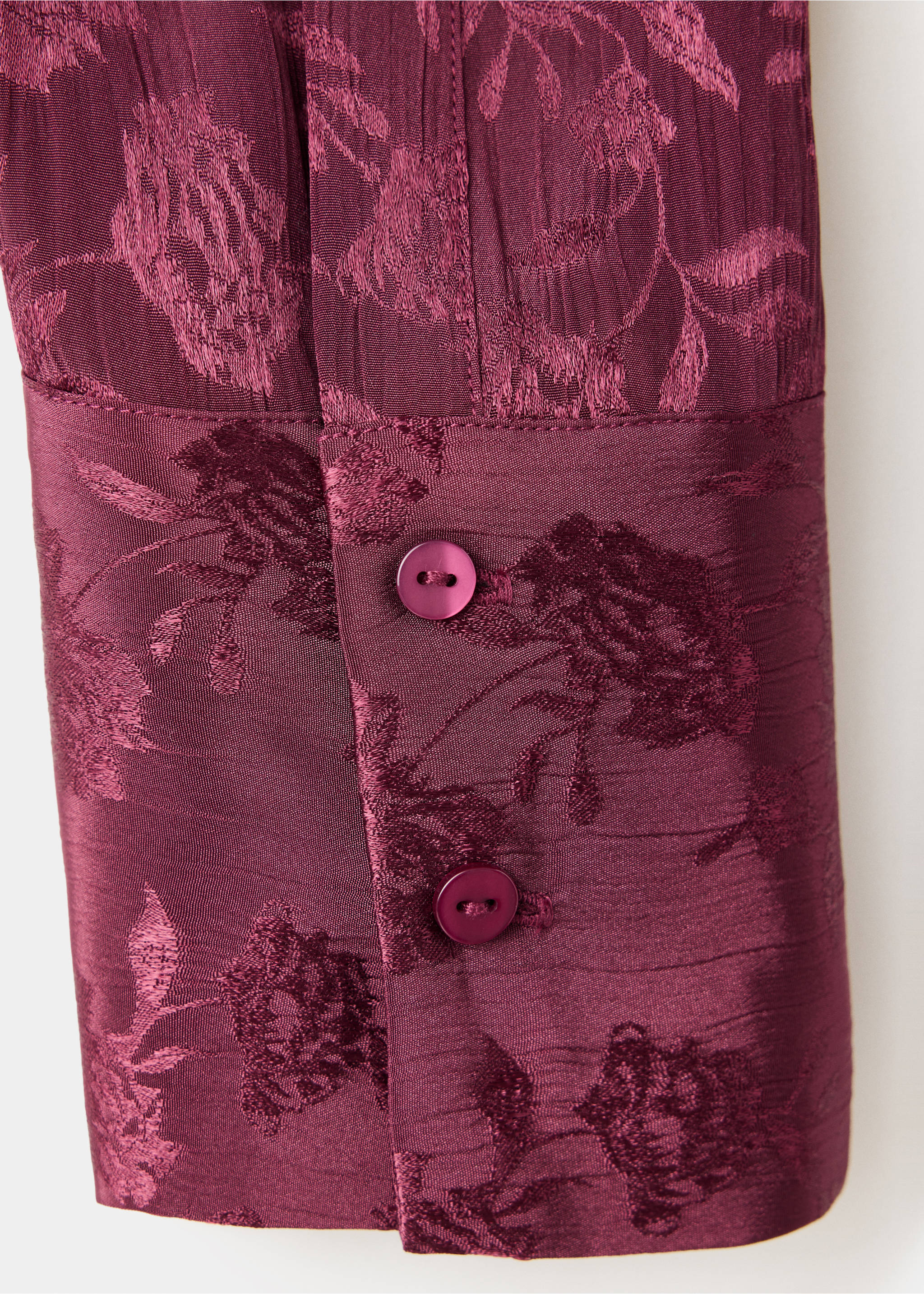 Burgundy shirt fabric detail showing tonal jacquard floral pattern and buttoned cuff., Burgundy. Ref: 37057115-00.