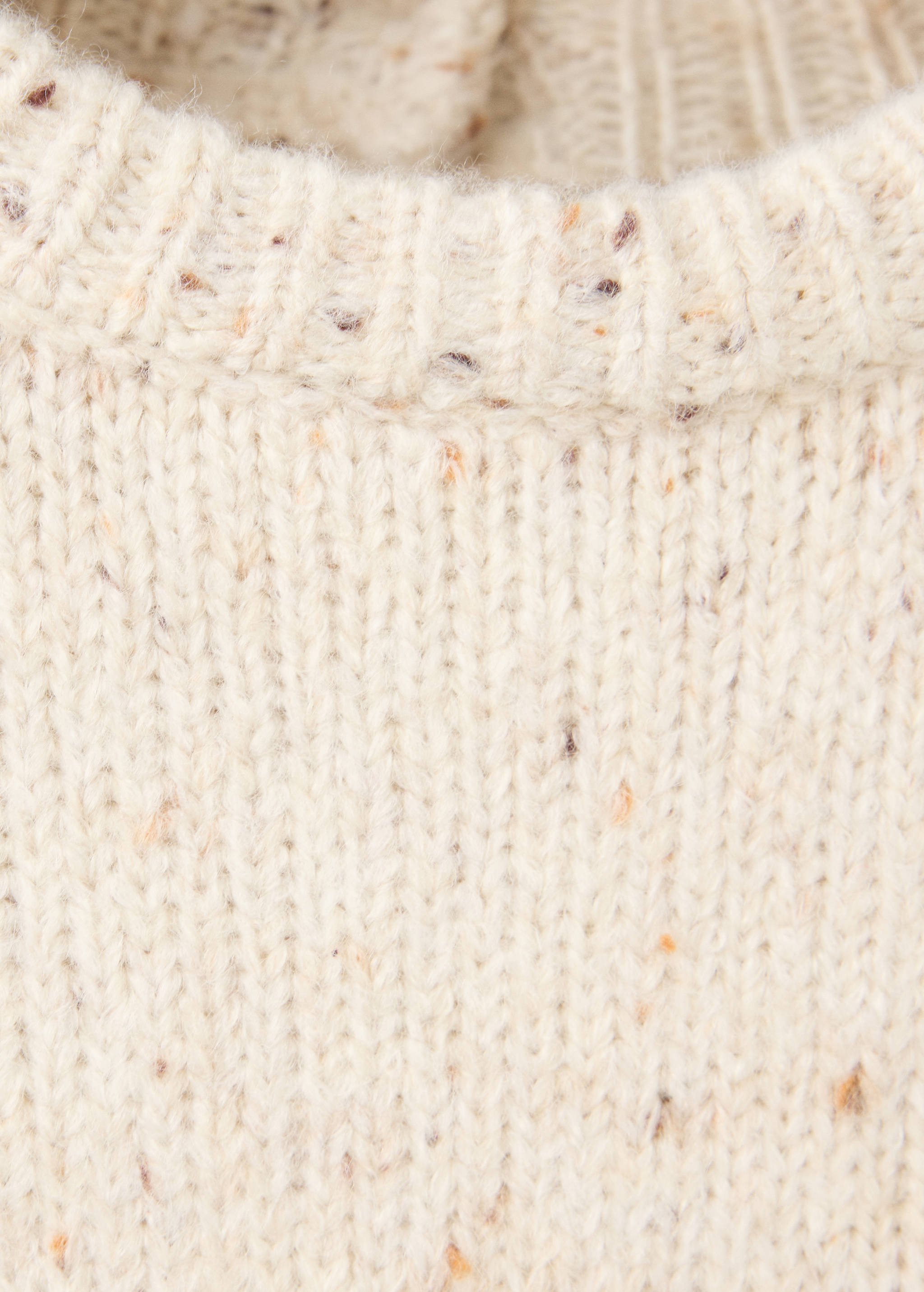 Cream speckled jumper with a ribbed crew neck and textured knit.