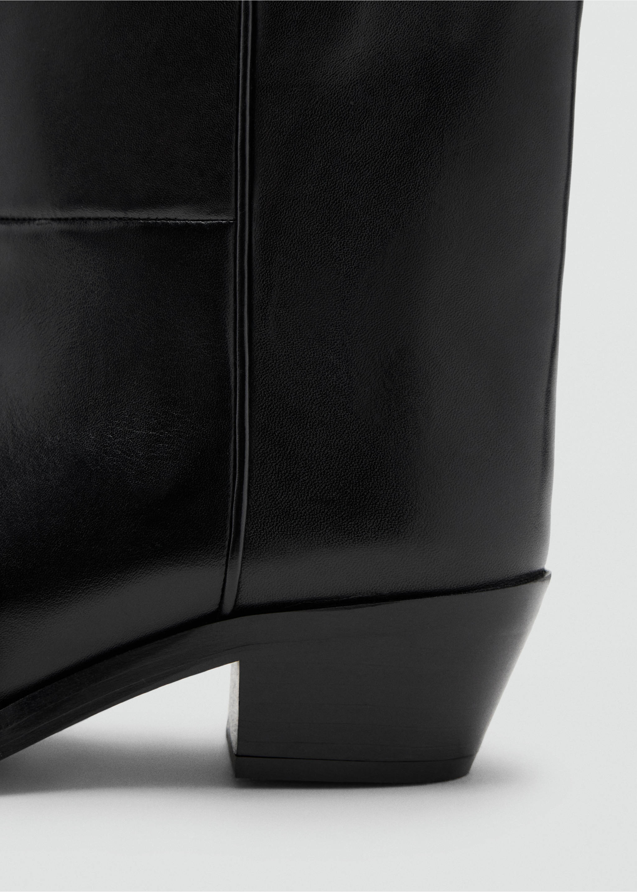 Close-up of black ankle boot showing the heel and side detail., Black. Ref: 37057127-00.