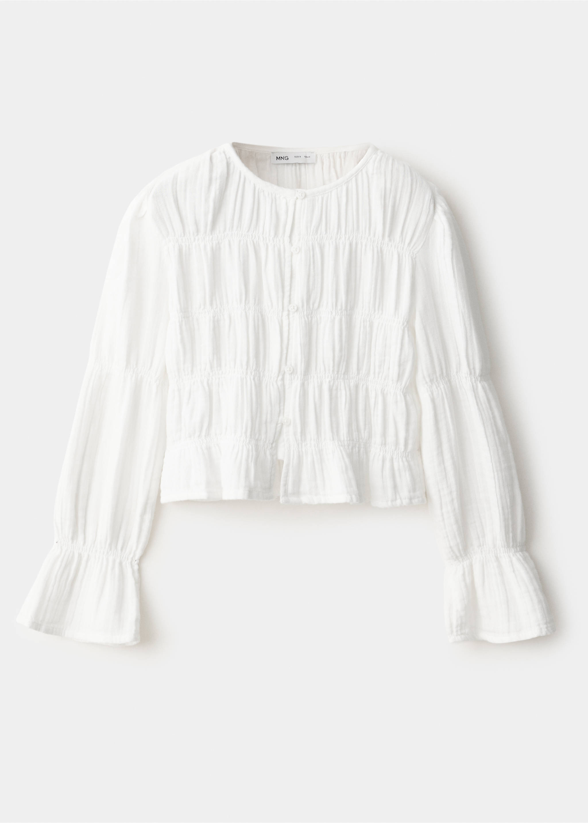 White long-sleeved smocked shirt with a rounded neckline and ruffled cuffs., White. Ref: 37057136-00.