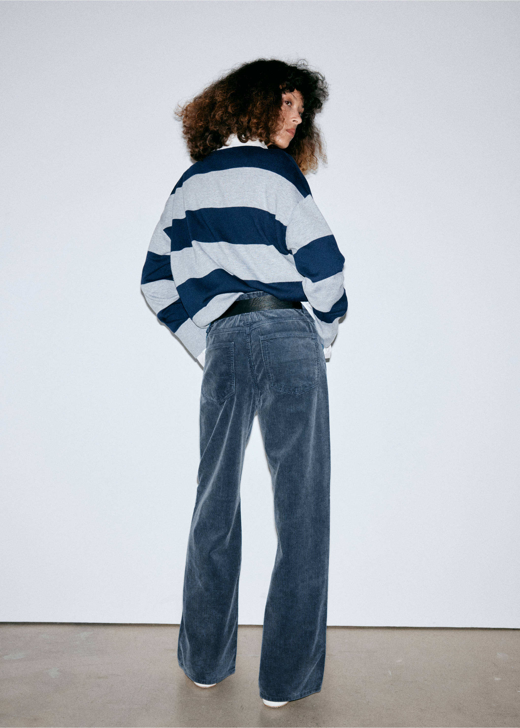 Blue corduroy trousers with back pockets, shown from the back., Blue. Ref: 37057780-01.