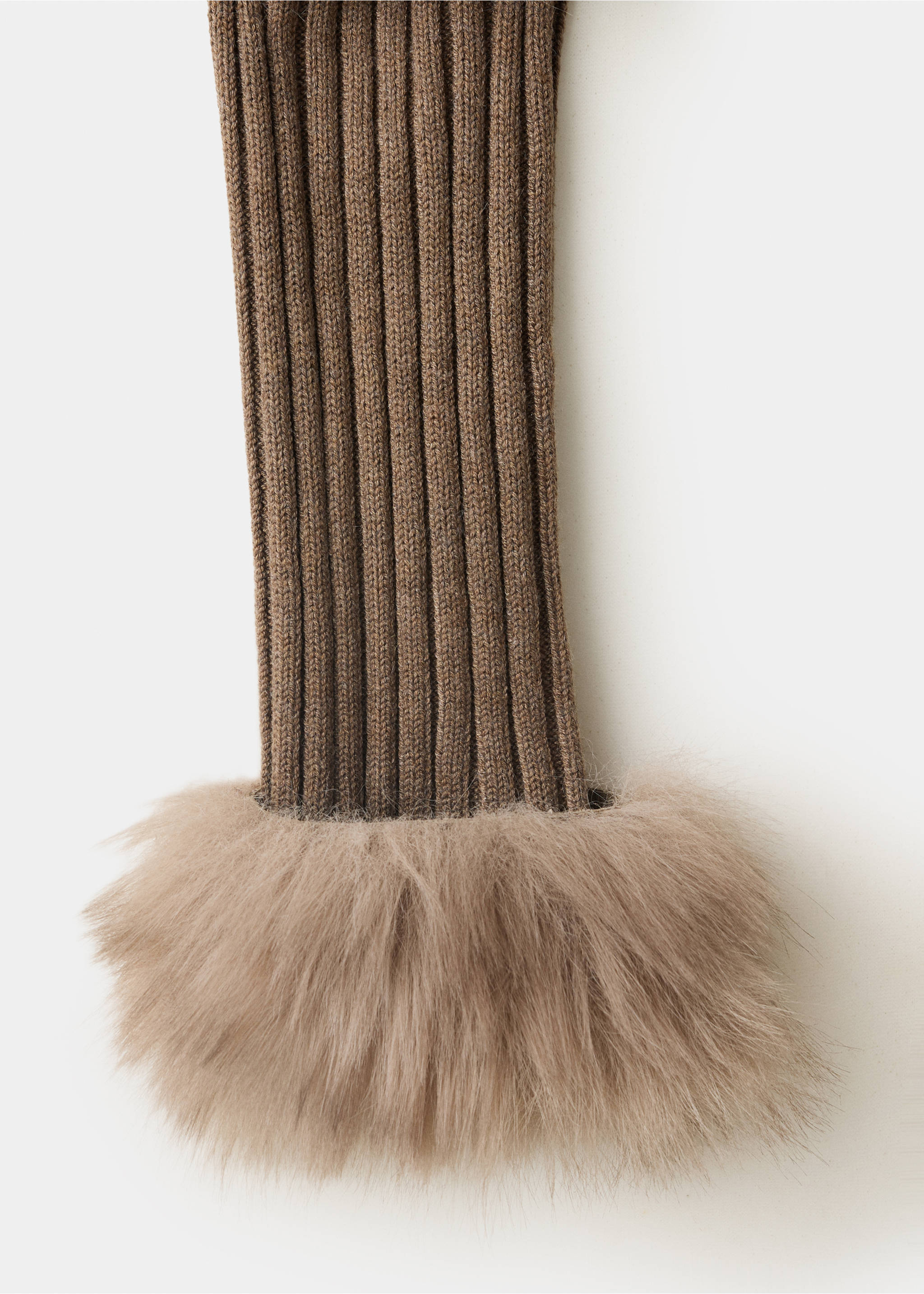 Brown ribbed cardigan sleeve with a fluffy beige faux-fur cuff in a close-up still life., Brown. Ref: 37057786-00.