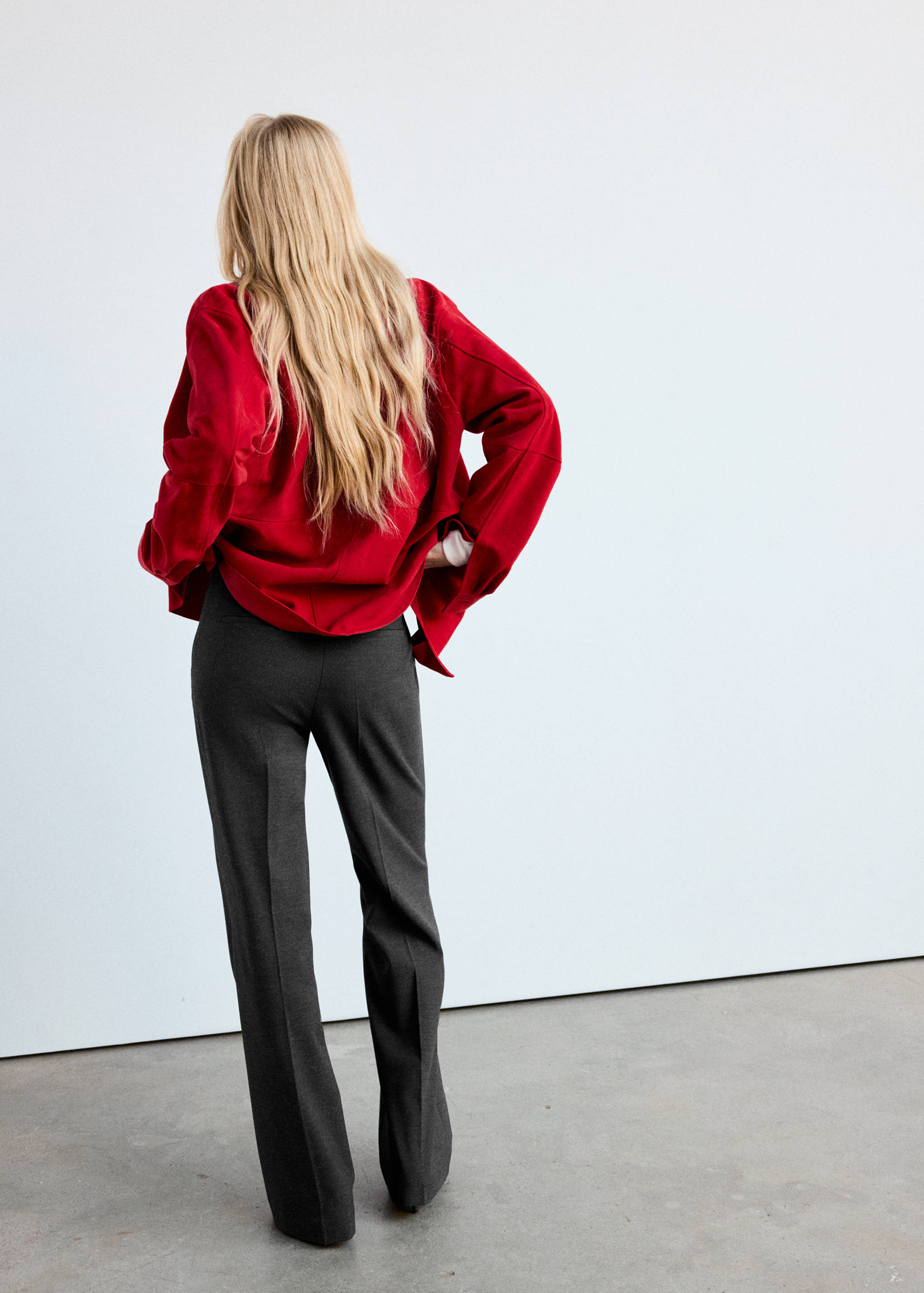 Flared trousers with pressed crease - Reverse of the article