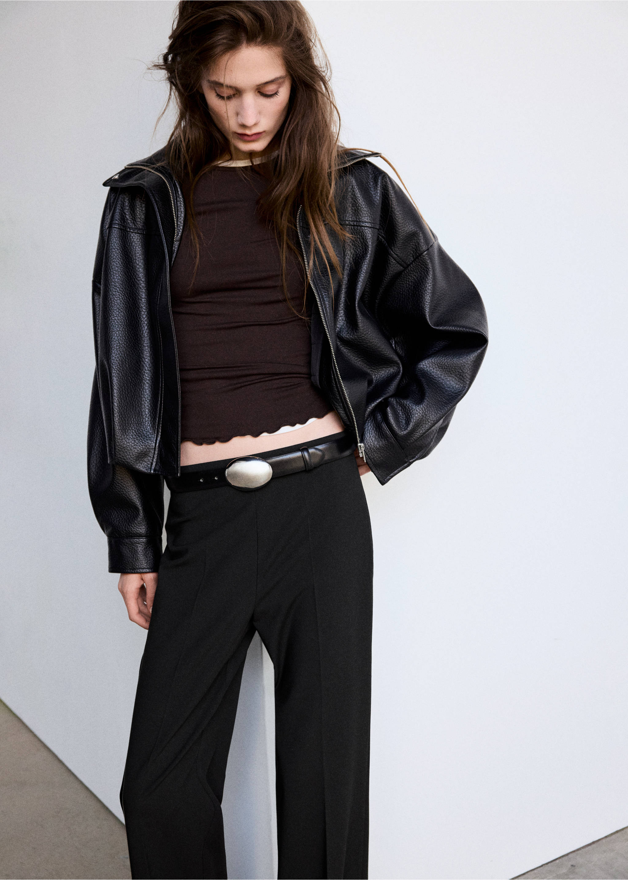 Flared trousers with pressed crease - Details of the article 1, Black. Ref: 37057795-00.