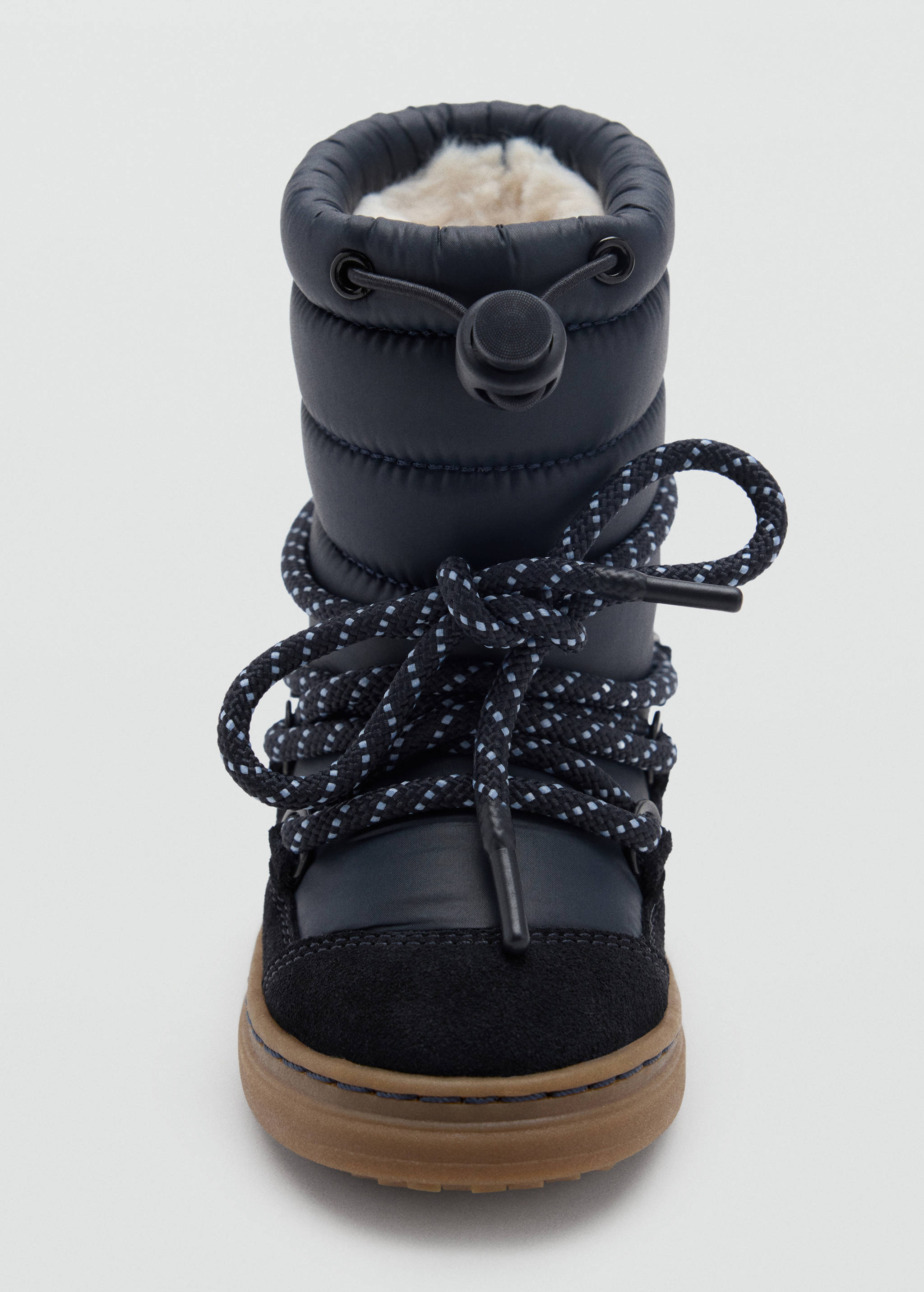 Dark navy padded boot with faux-fur lining and speckled laces.