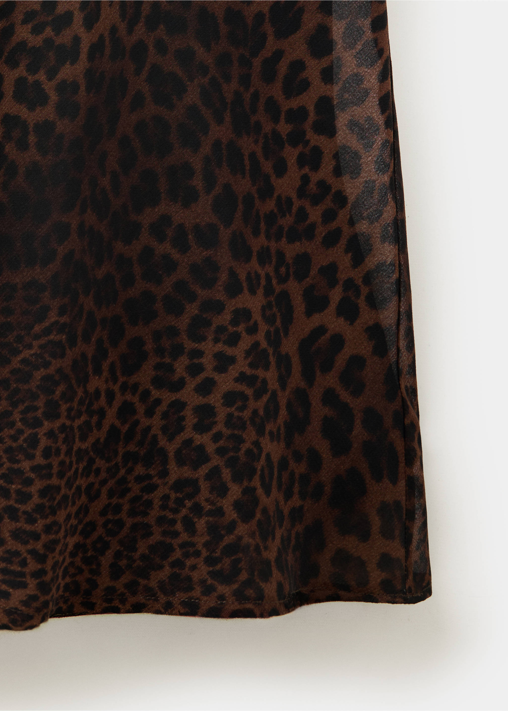 Close-up of a brown leopard print dress fabric., Black. Ref: 37057812-00.