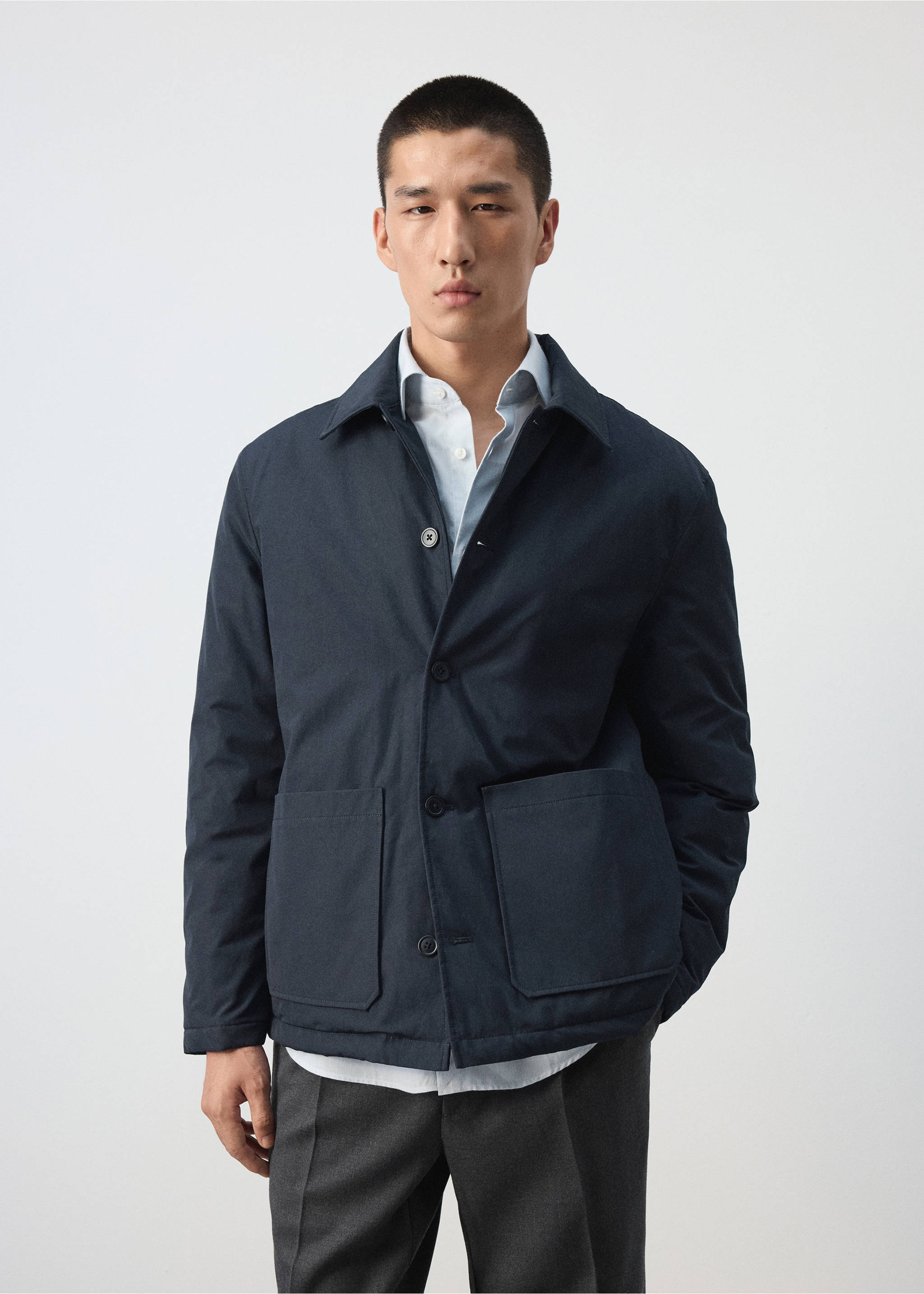 Dark navy blue jacket with patch pockets and a shirt collar., Night Blue. Ref: 37057882-00.