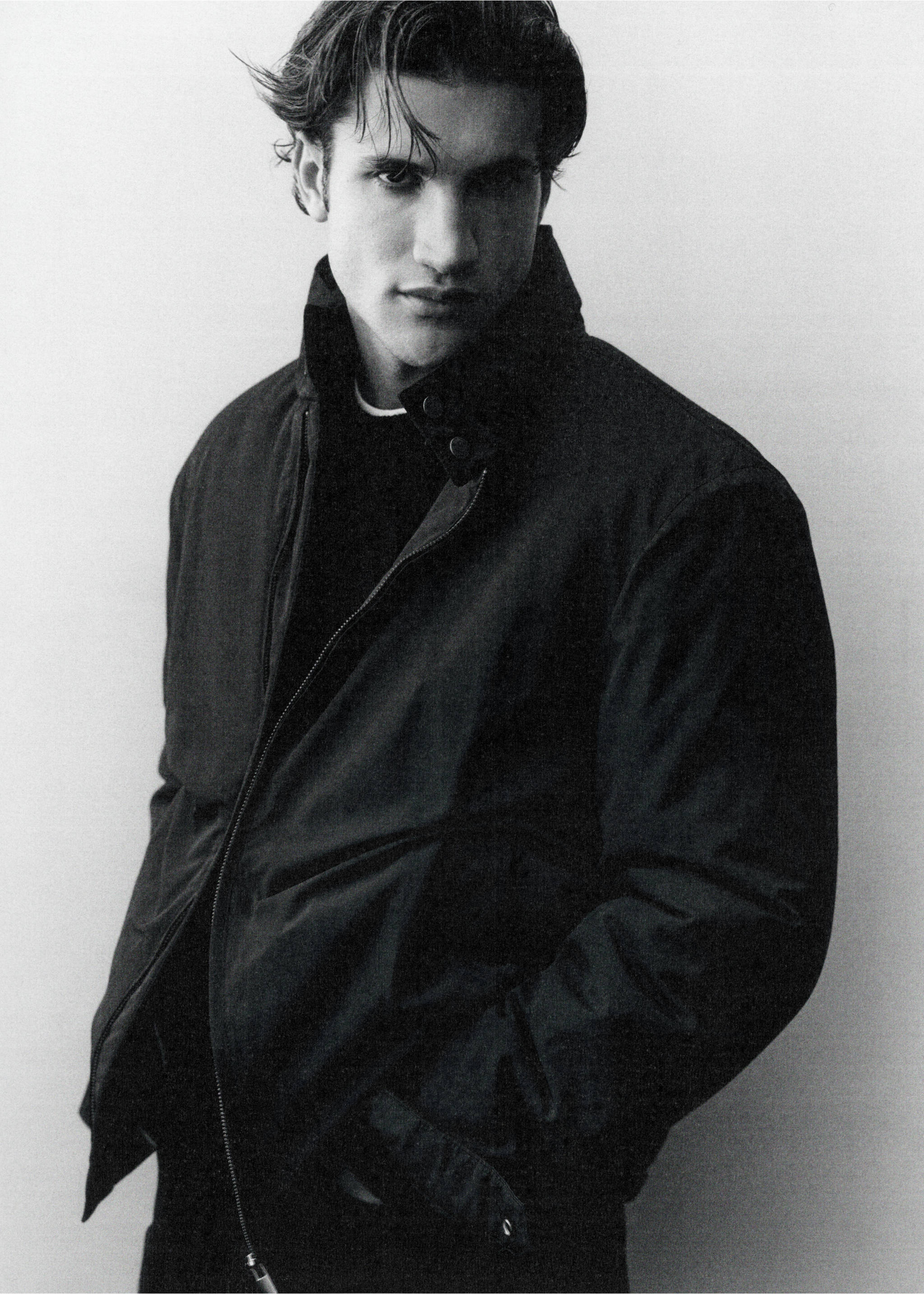 Black zip-up jacket with a high collar and snap buttons., Night Blue. Ref: 37057884-00.