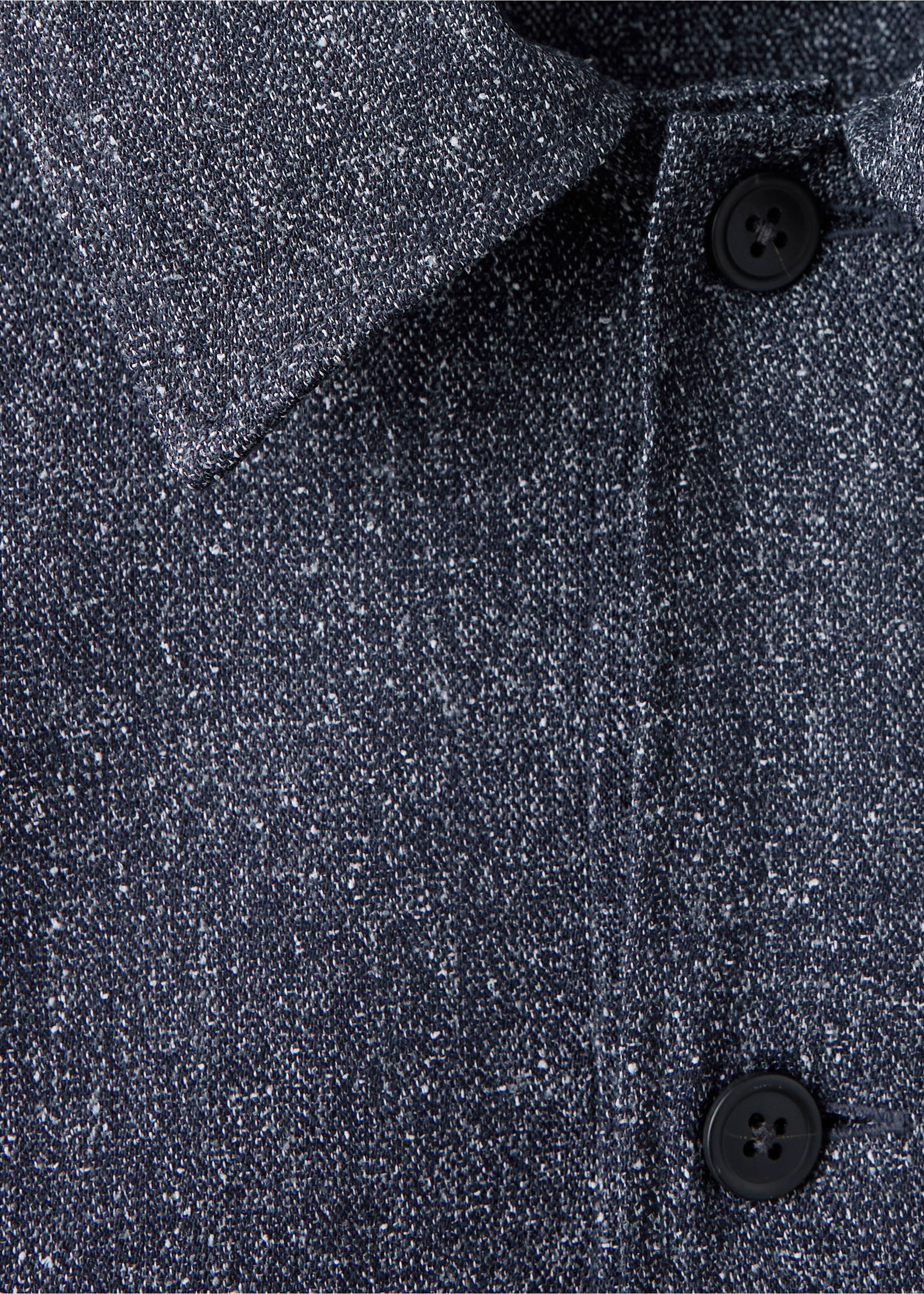 Close-up of a dark grey speckled overshirt featuring a point collar and dark buttons., Blue. Ref: 37057885-00.