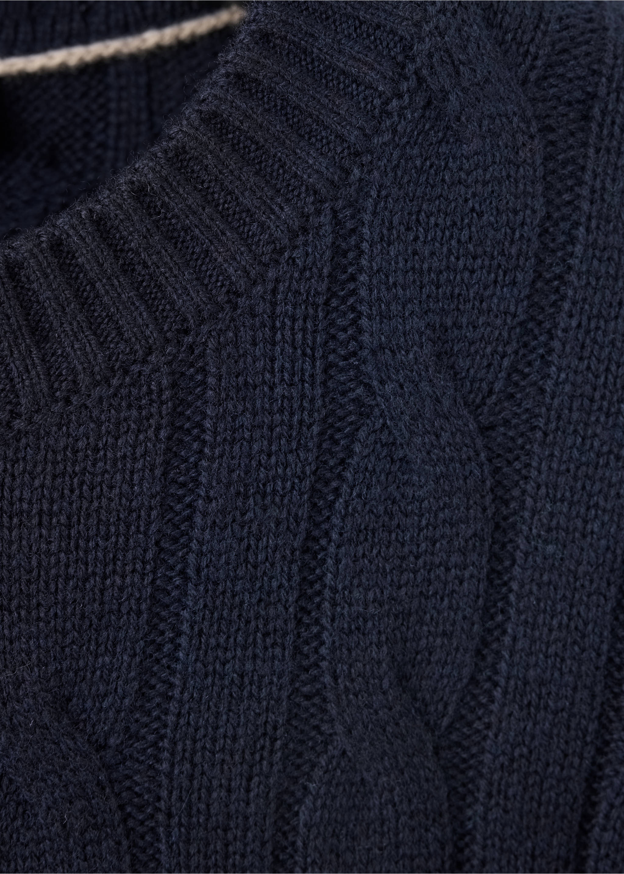 Close-up of a navy blue cable-knit jersey with a ribbed crew neck., Navy. Ref: 37057886-00.