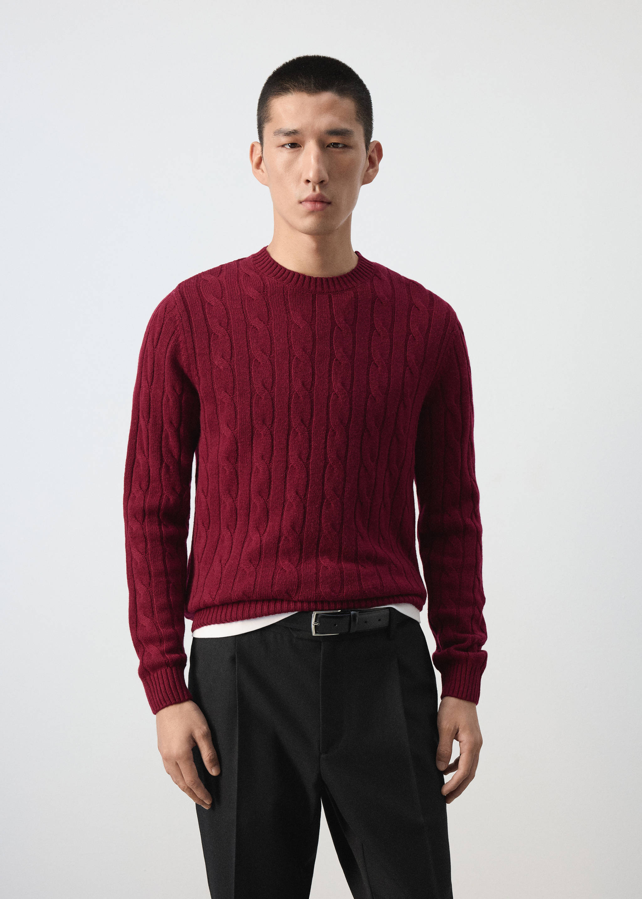 Burgundy cable-knit jersey with a ribbed crew neck.