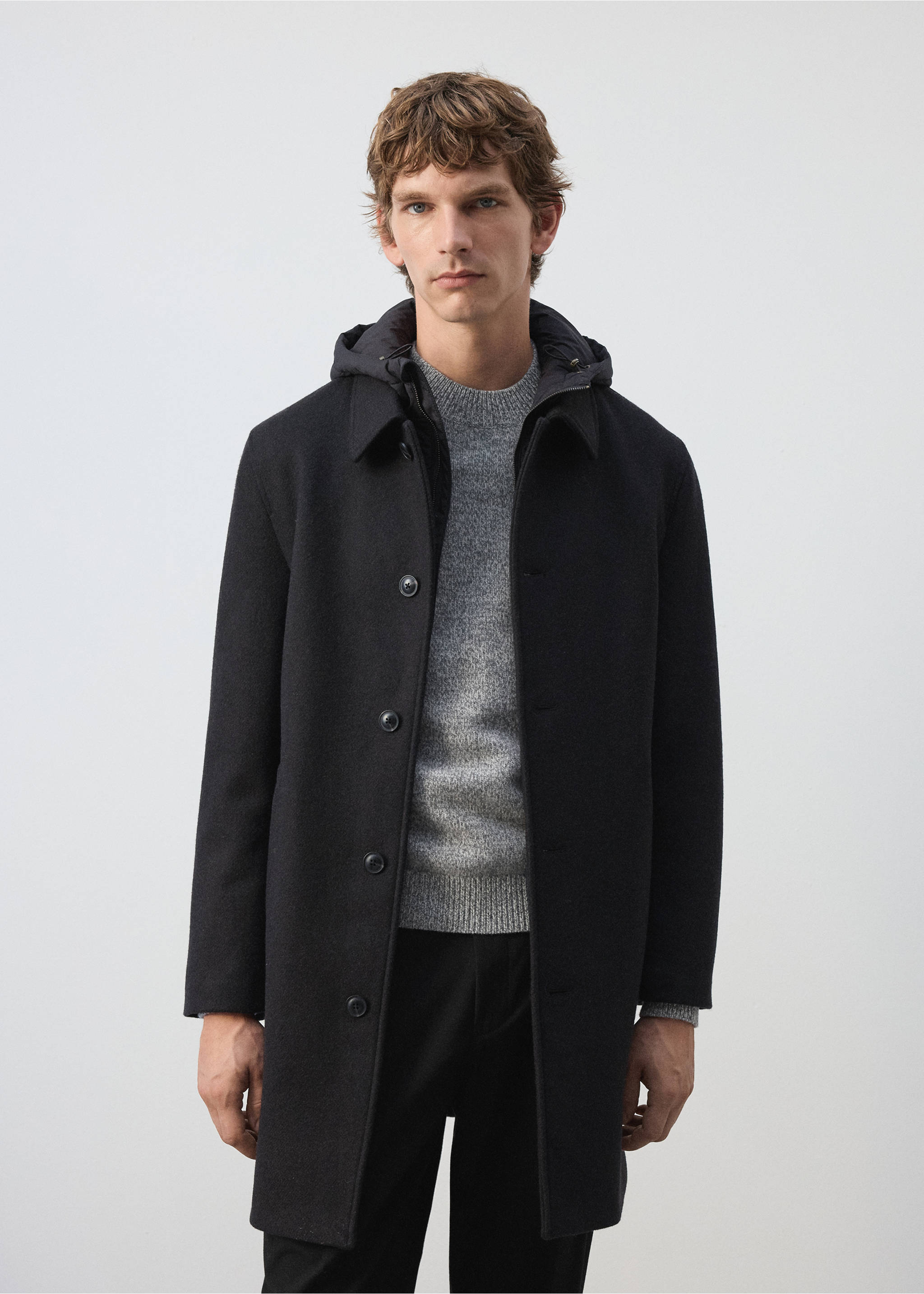 Navy blue coat with button fastening and collar, worn over a grey knit sweater., Coffee. Ref: 37057888-00.