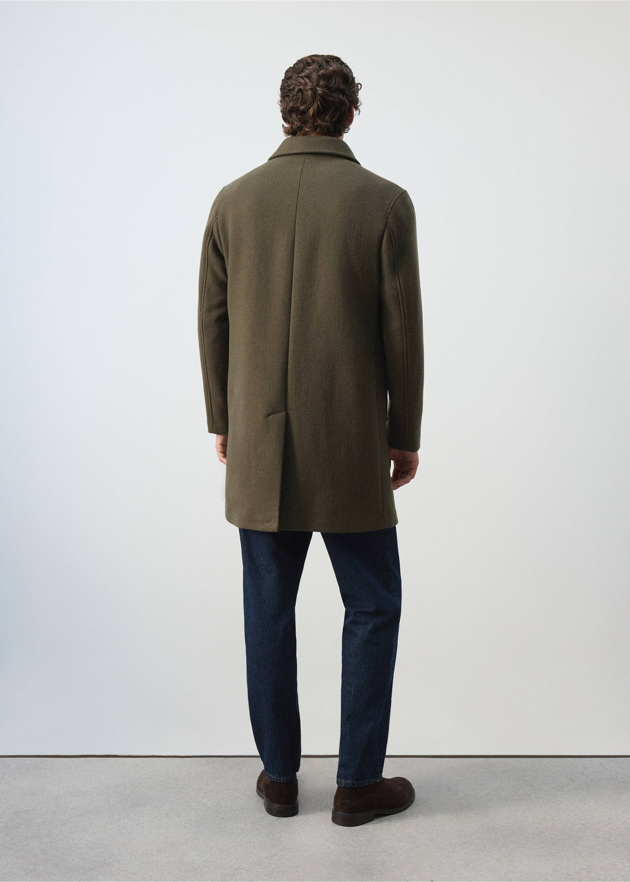 Dark green coat shown from the back, paired with dark trousers., Medium Brown. Ref: 37057888-00.