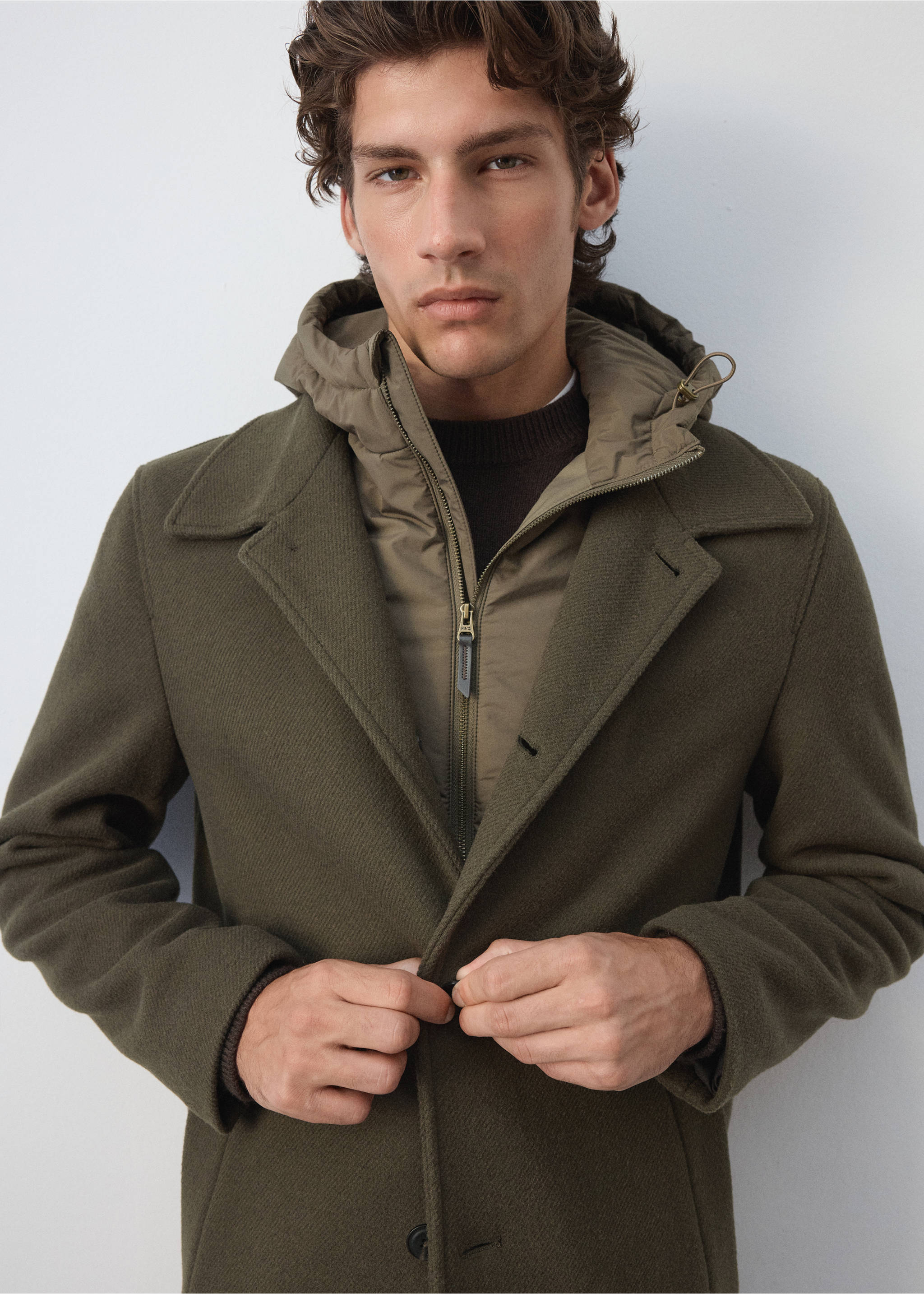 Olive green wool coat with wide lapels and a quilted hooded inner vest., Medium Brown. Ref: 37057888-00.