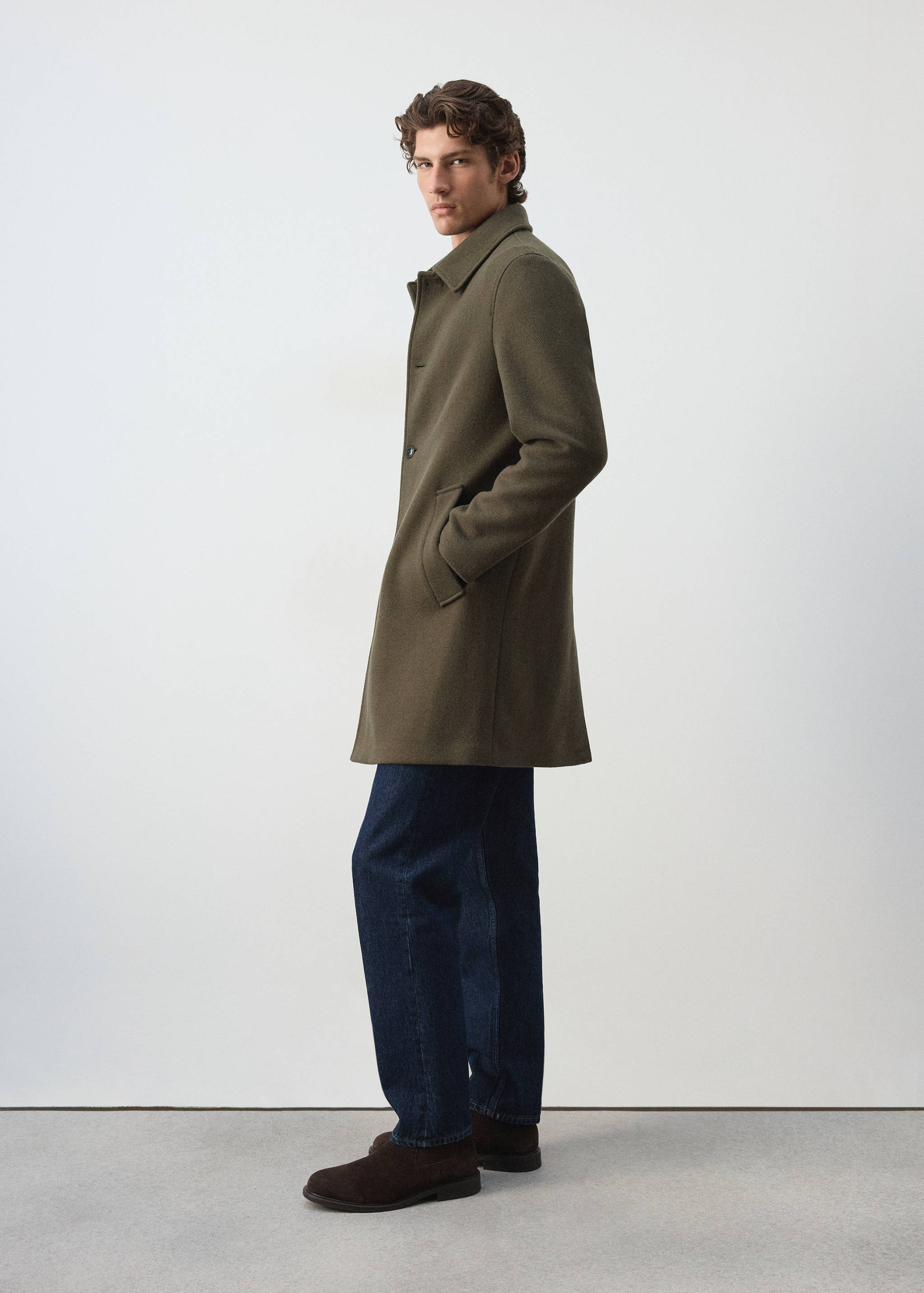 Dark olive green wool coat with a classic collar and front buttons.