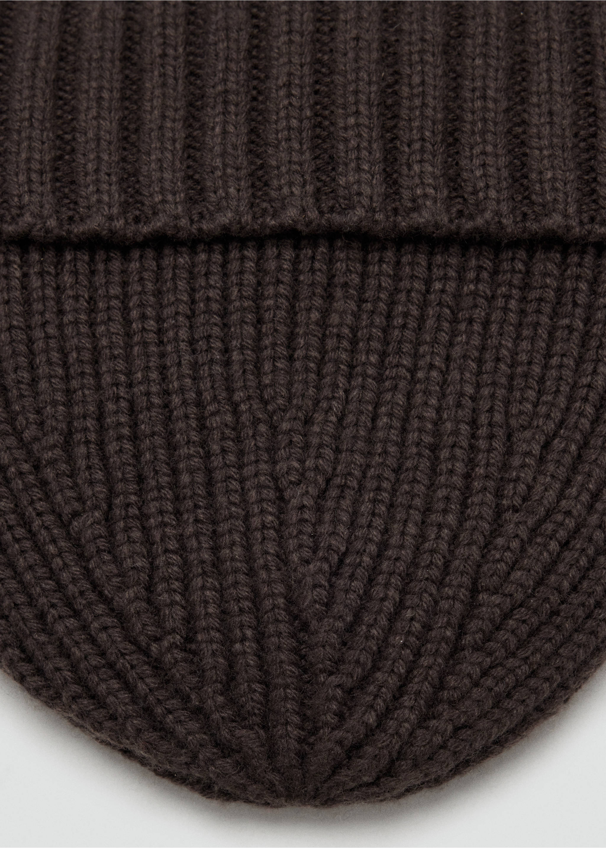 Close-up of a dark brown ribbed knit beanie., Chocolate. Ref: 37057902-00.