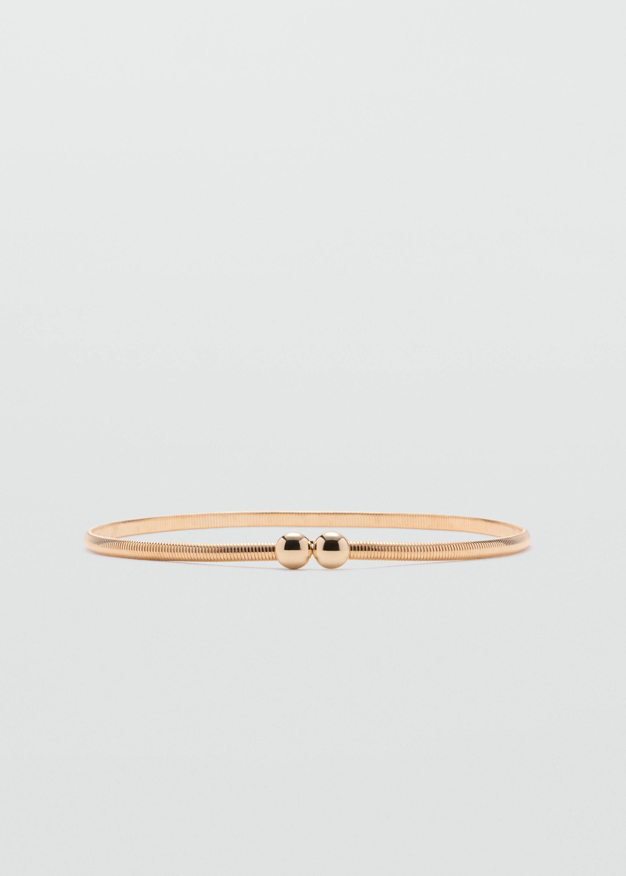 Slim metallic gold belt with a textured coil band and twin spherical bead closures.