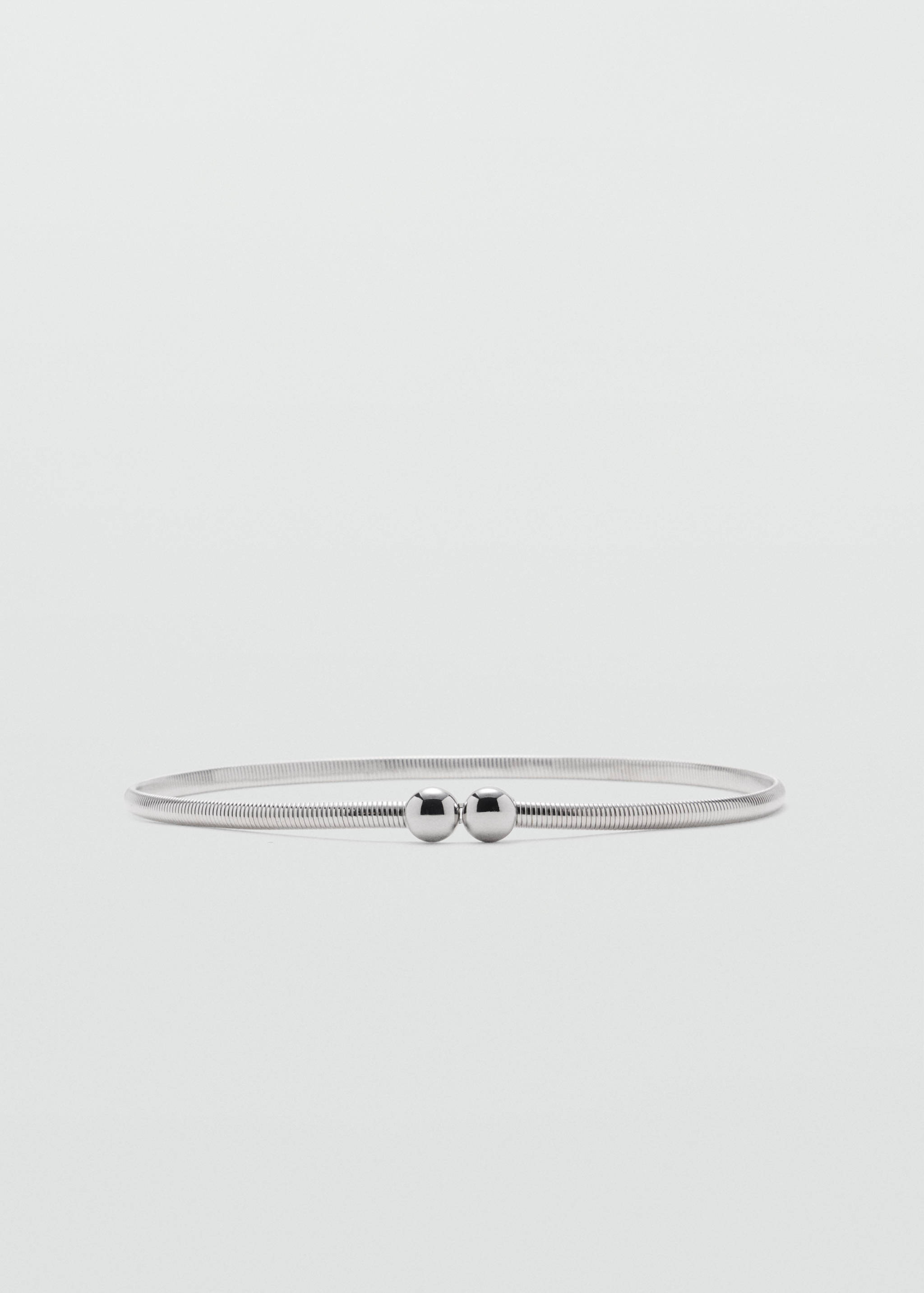 Metallic silver coiled belt with two polished spherical beads.