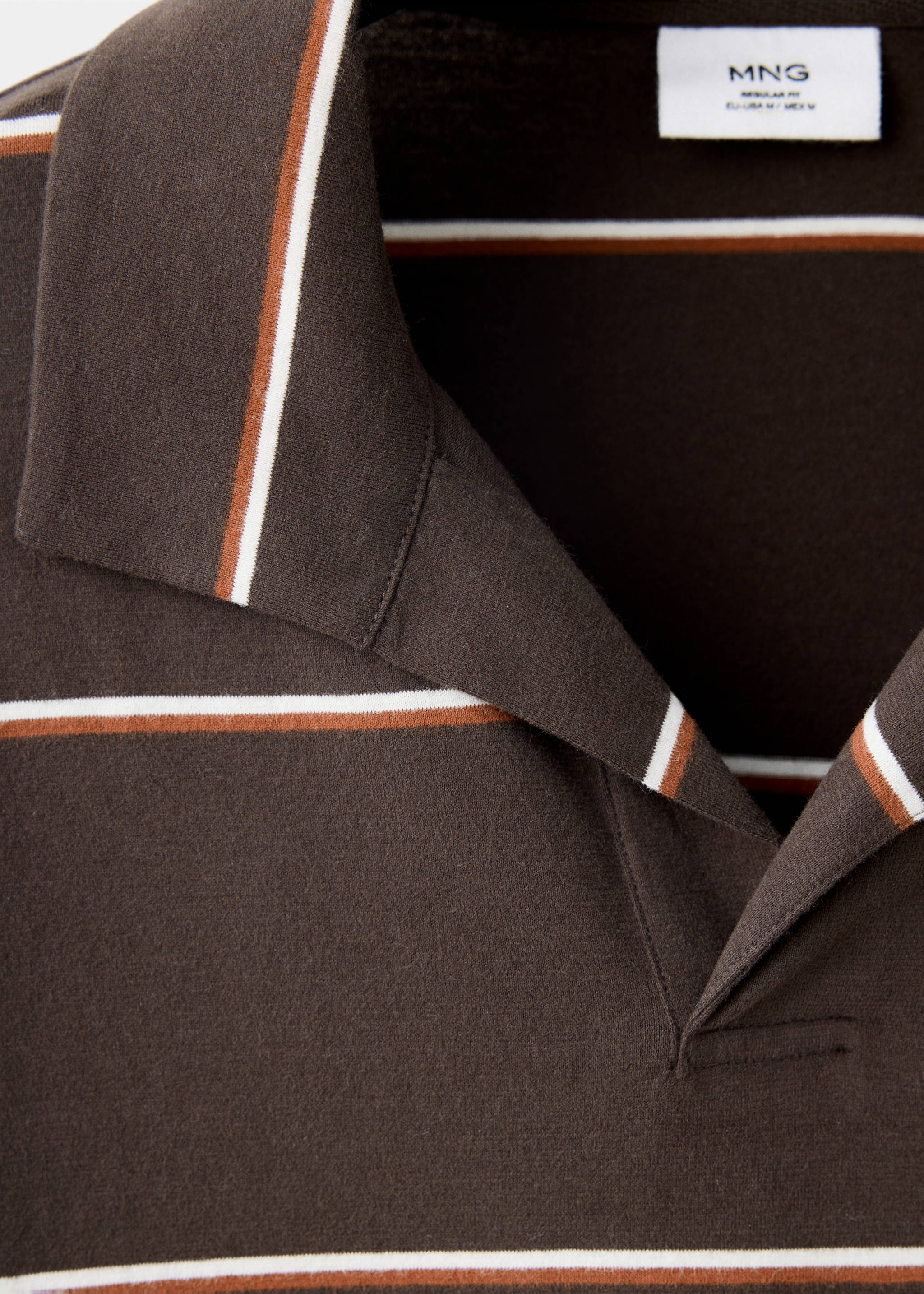 Close-up of a brown striped knit polo shirt collar., Coffee. Ref: 37057912-00.