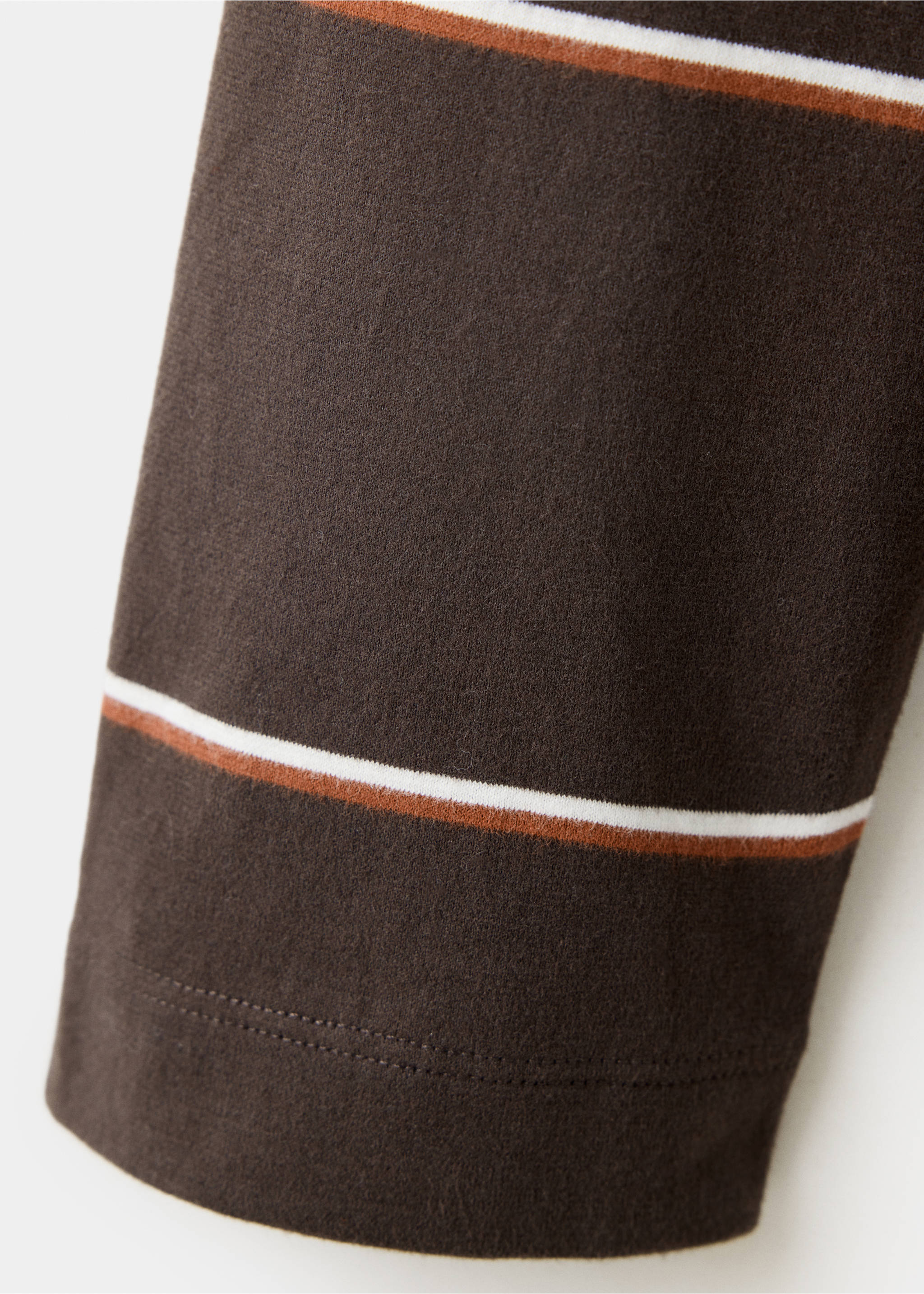 Close-up of the dark brown polo shirt fabric showing white and rust stripes., Coffee. Ref: 37057912-00.