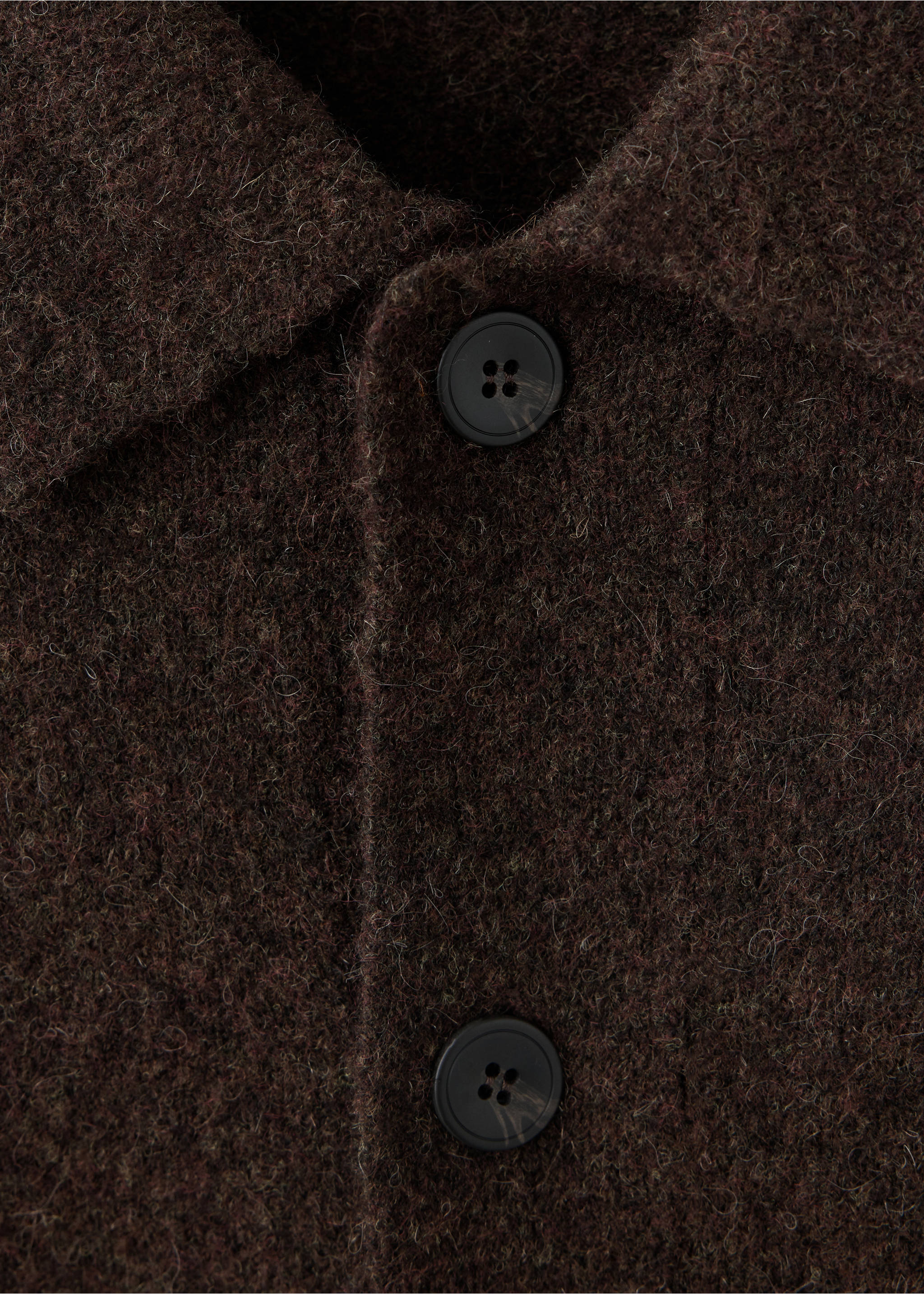 Close-up of a dark brown textured shirt collar and button placket., Chocolate. Ref: 37057916-00.