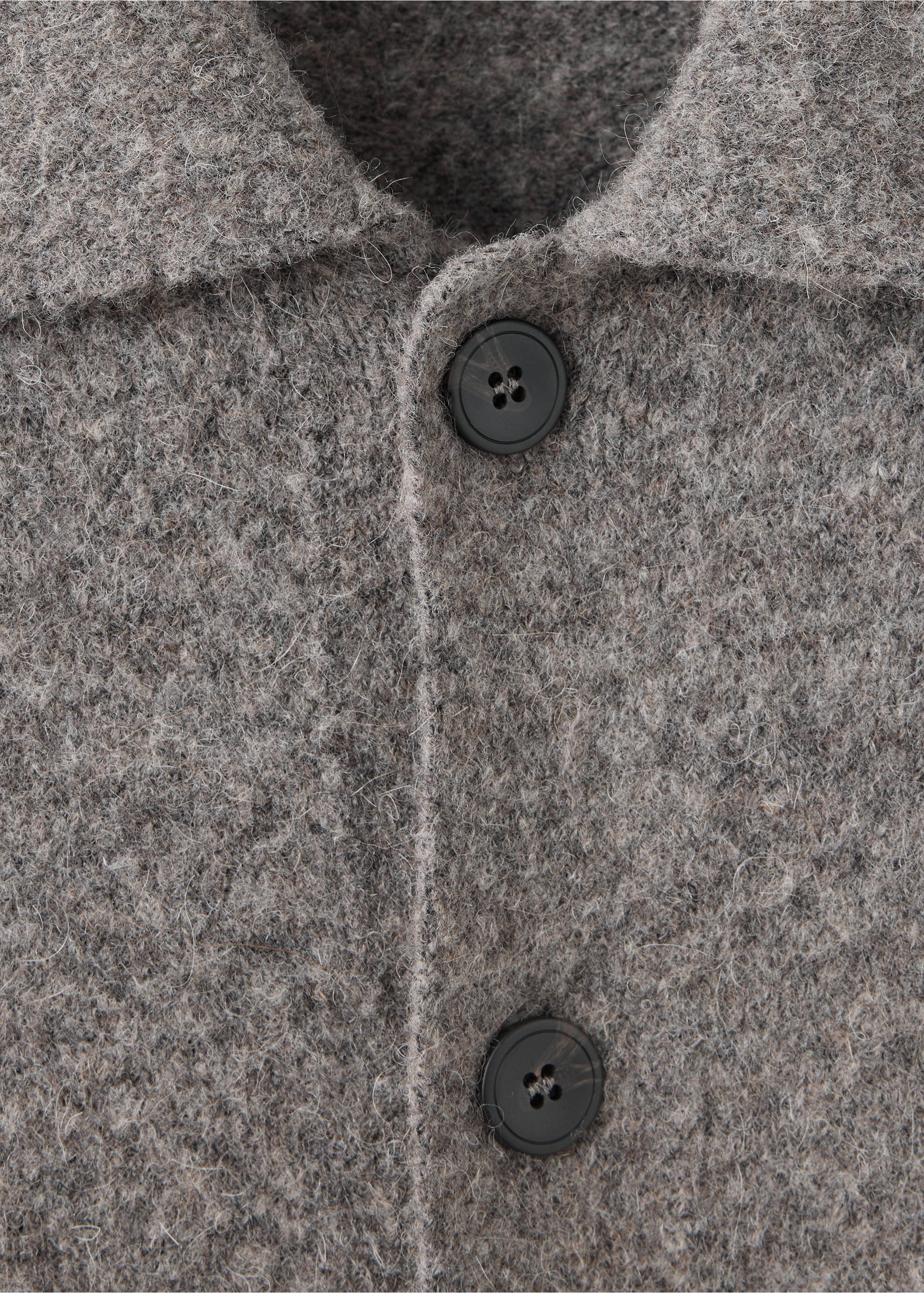 Close-up of a grey heathered shirt with a textured woolen finish and dark buttons., Medium Brown. Ref: 37057916-00.