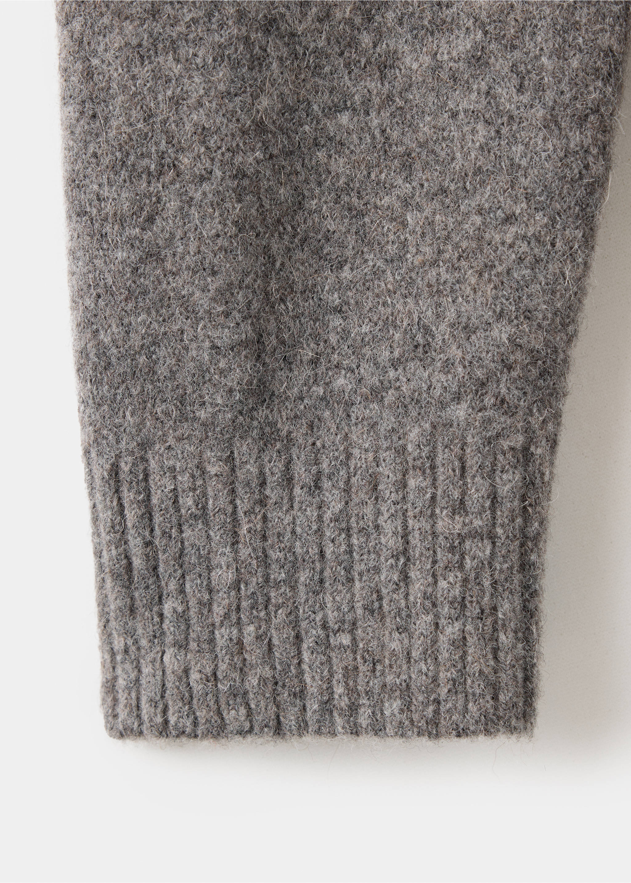 Close-up of a grey melange shirt fabric detail and ribbed cuff., Medium Brown. Ref: 37057916-00.