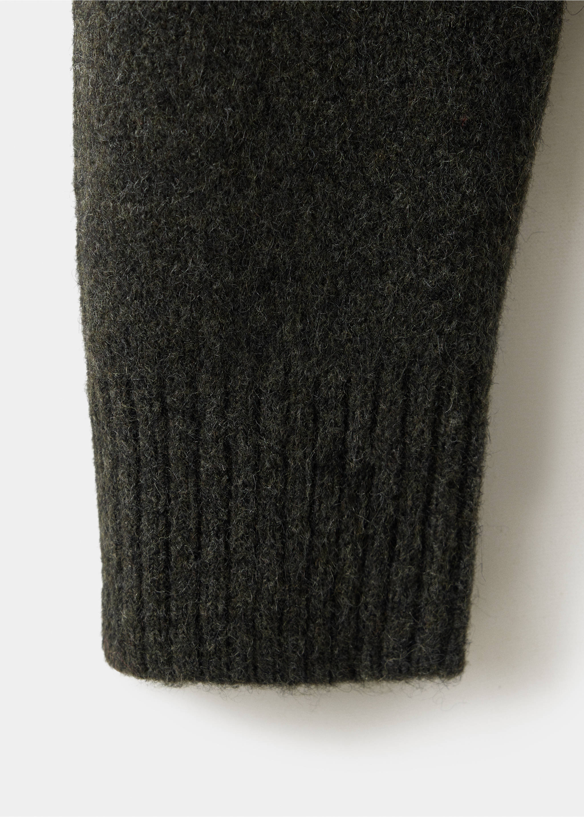 Dark green shirt fabric detail showing the textured knit material and ribbed cuff., Khaki. Ref: 37057916-00.