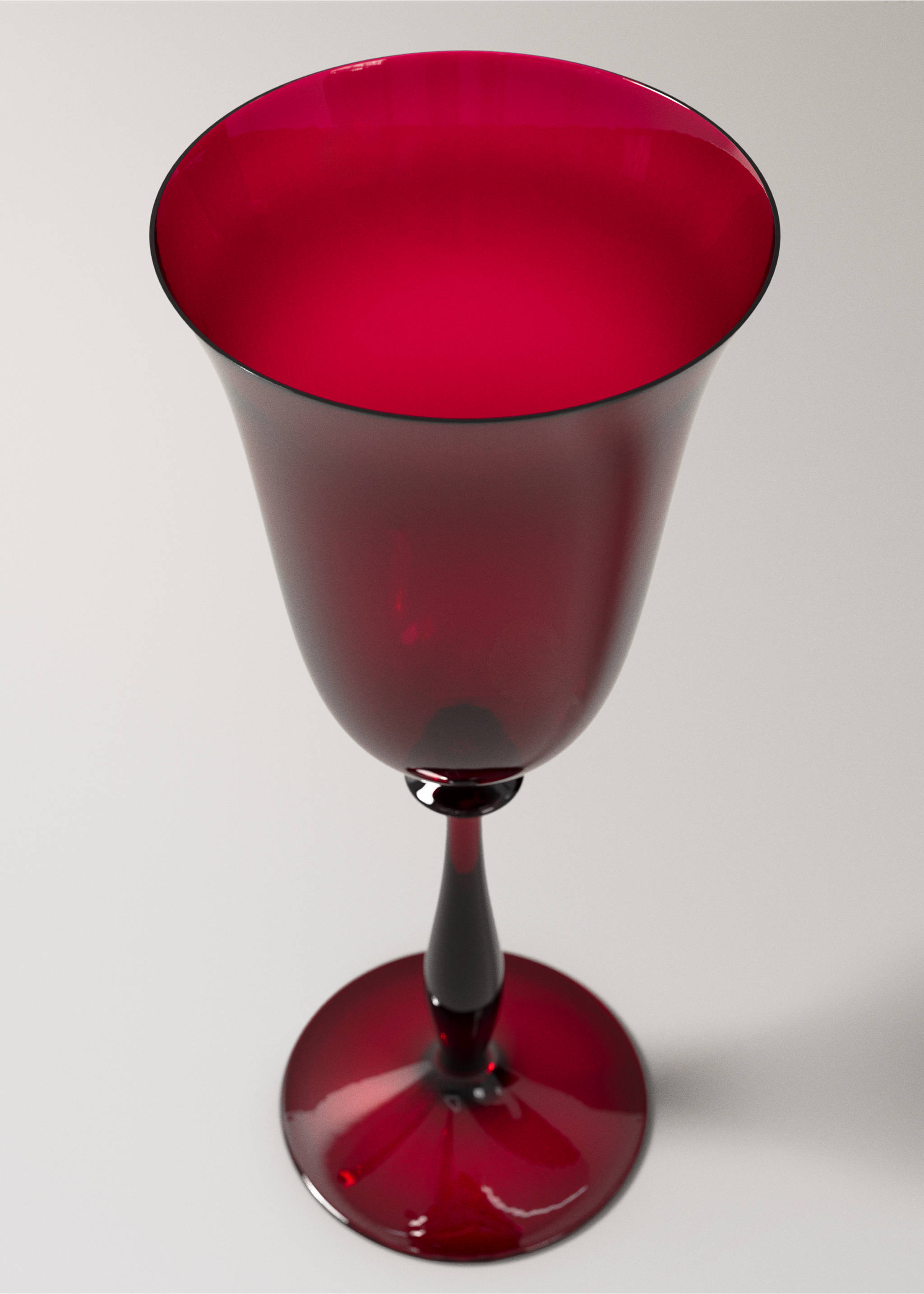 Deep red glass goblet with a wide bowl and slender stem., Red. Ref: 37057919-00.