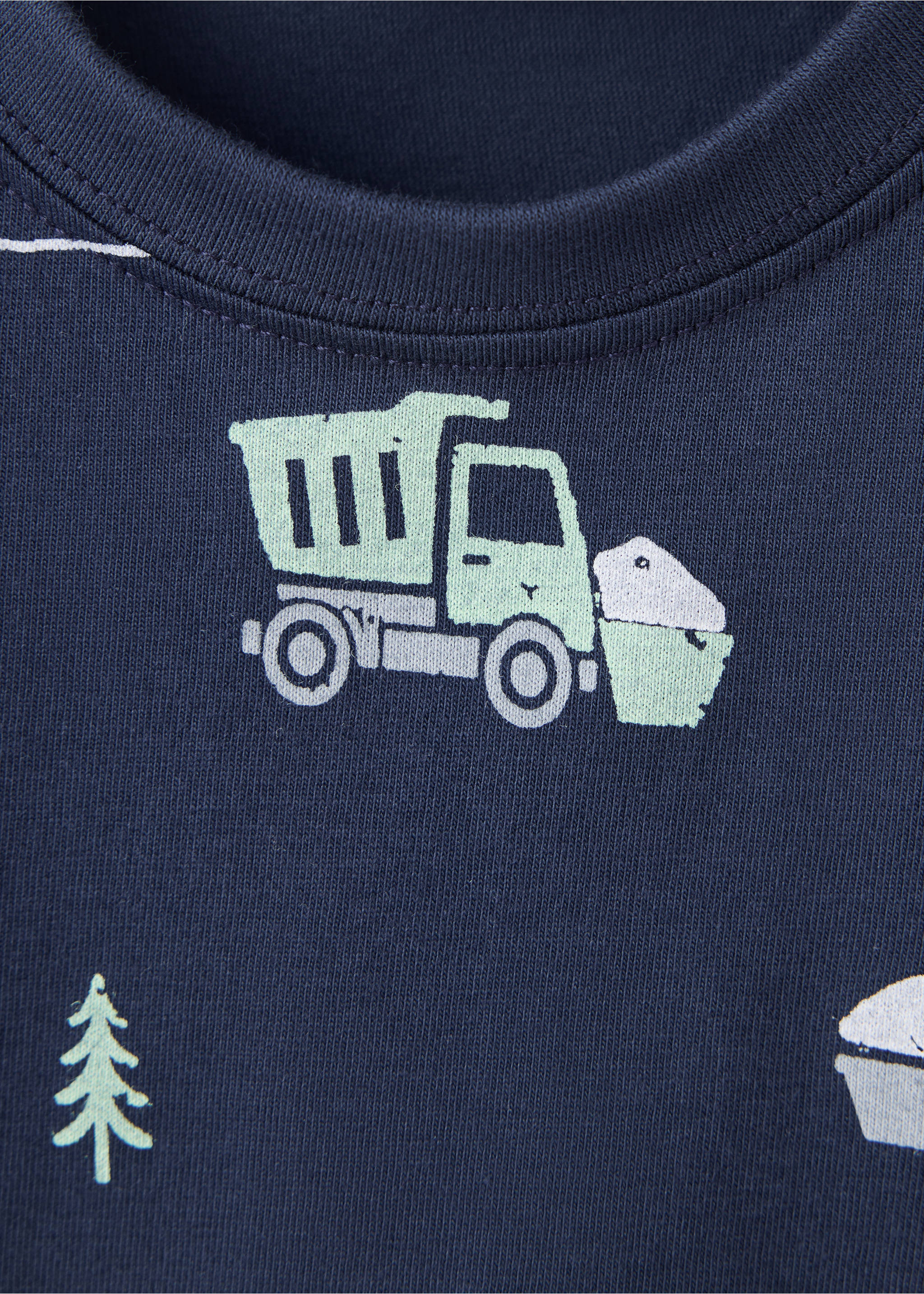Close-up of a navy blue pyjama top featuring a construction vehicle print and crew neck., Navy. Ref: 37057921-00.