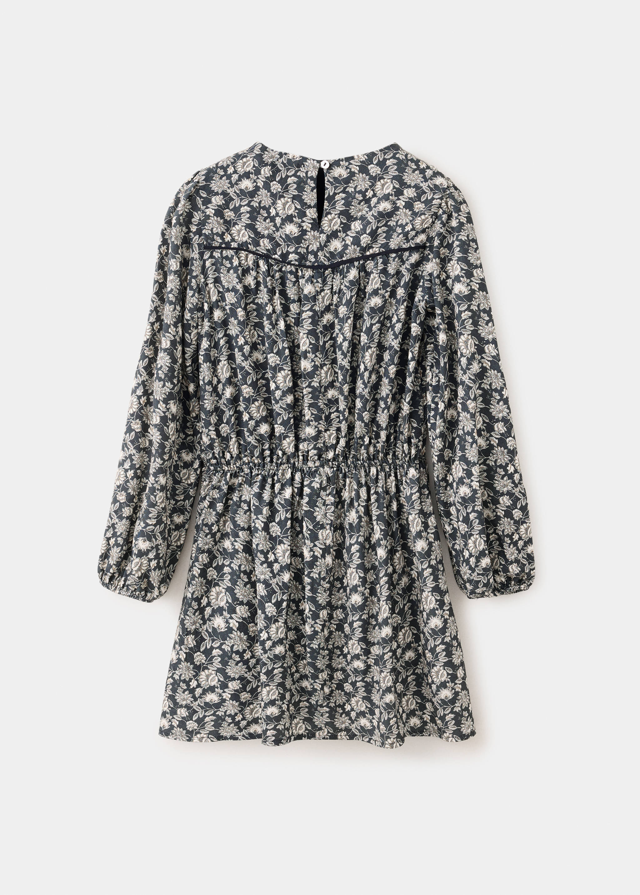 Dark floral children's dress shown from the back, with a round neck, long sleeves, and elasticated waist.