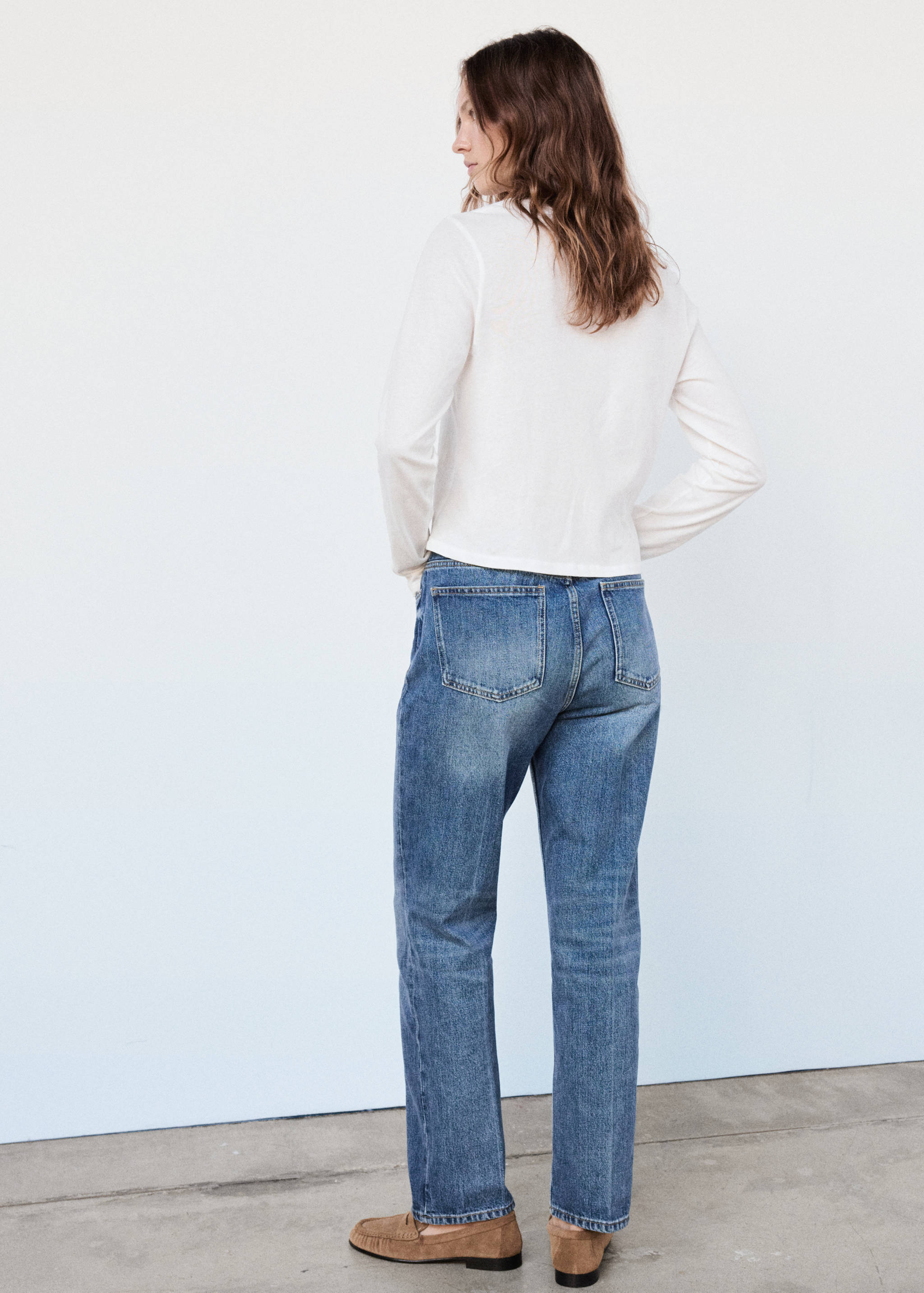 100% Cotton Button-Down T-Shirt - Reverse of the article