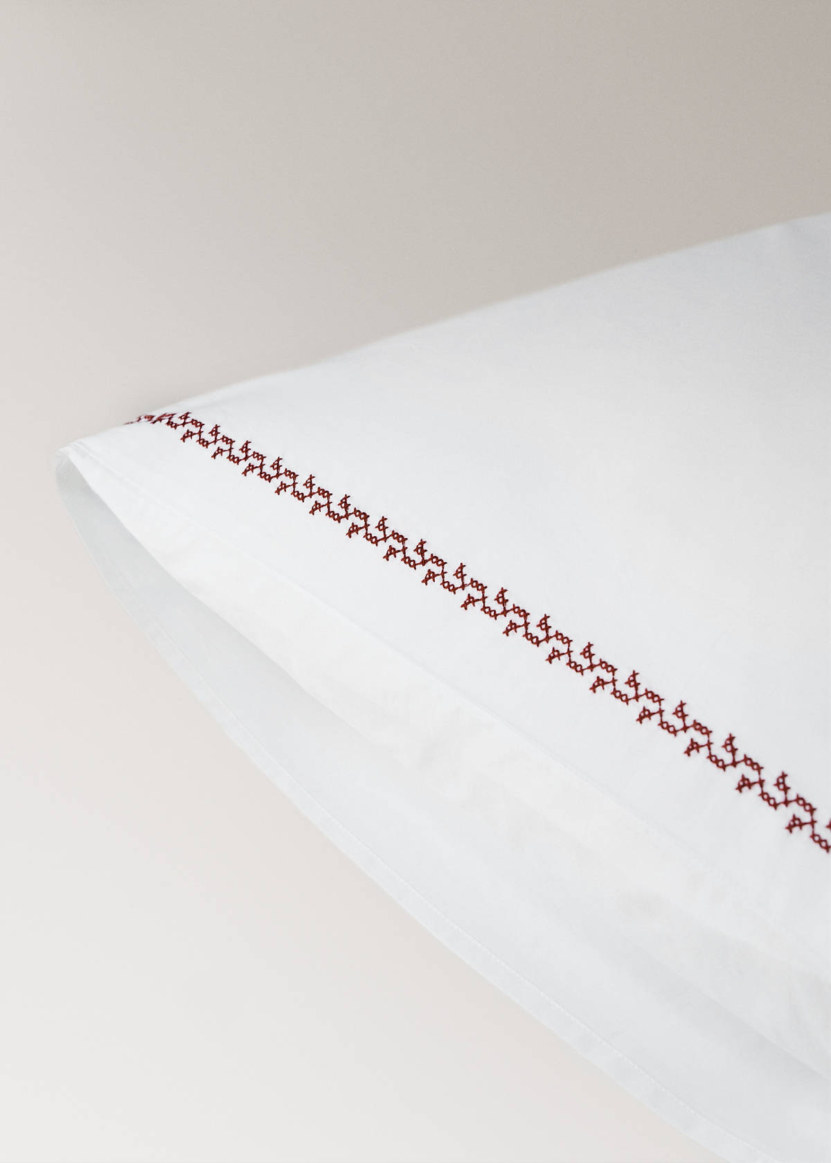 Two cotton pillowcases with embroidered detailing, 60 x 60 cm — Red