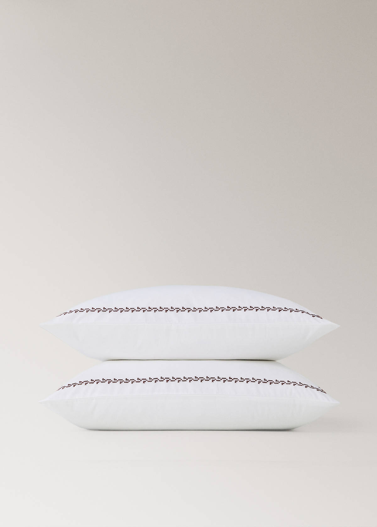 Two cotton pillowcases with embroidered detailing, 60 x 60 cm — Red