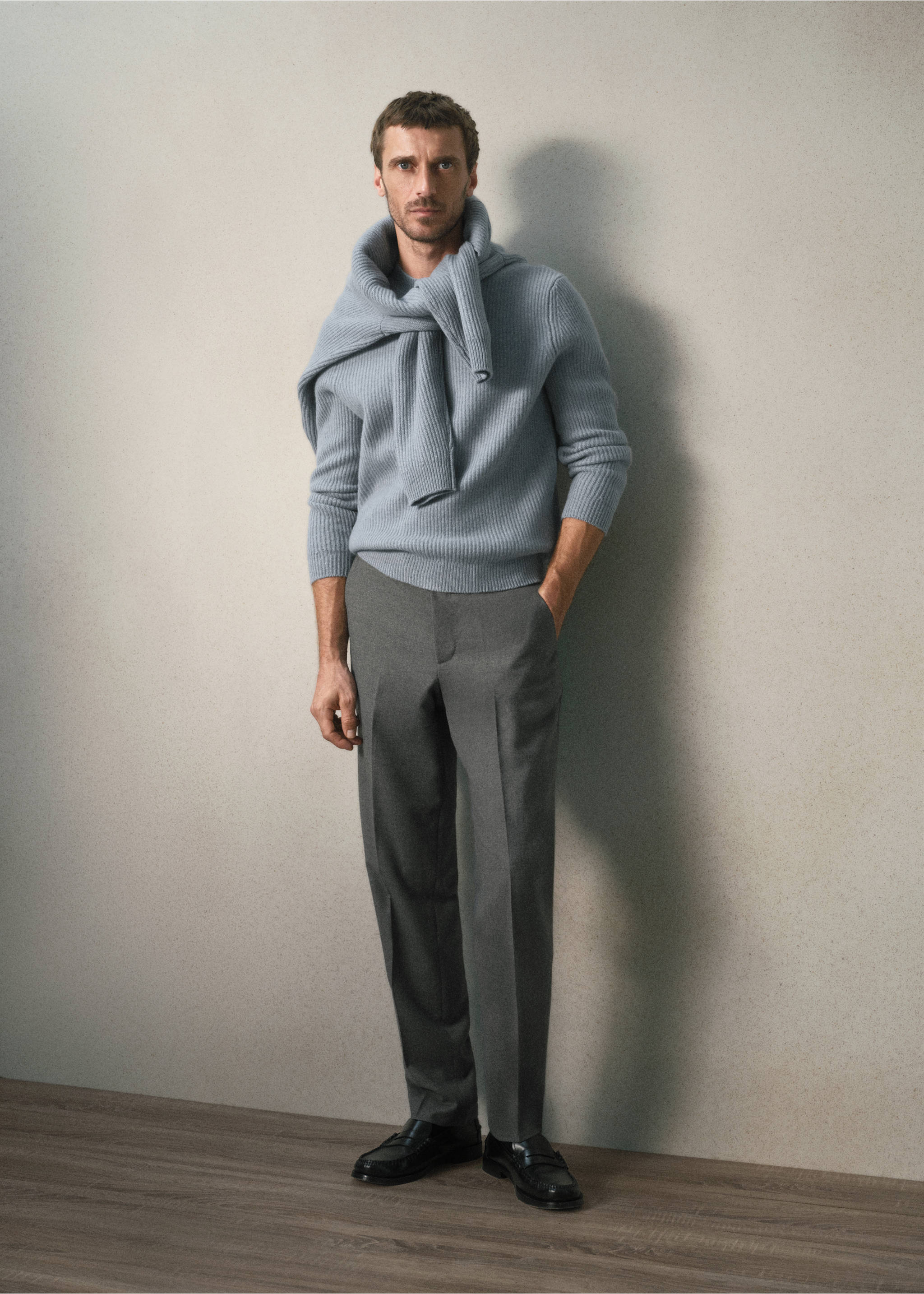Light blue ribbed knit sweater with high rolled collar, styled with a matching sweater draped over shoulders., Sky Blue. Ref: 37058274-00.