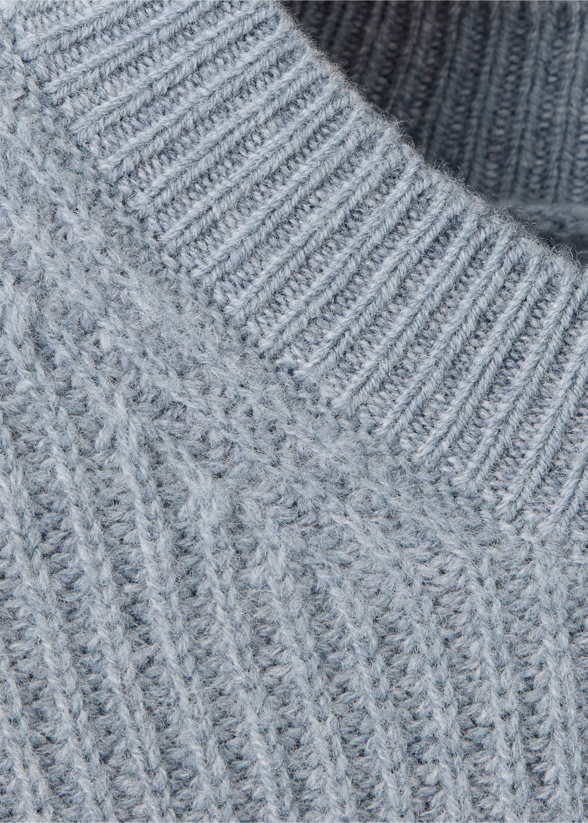 Close-up of a light blue men's knit jumper showing the rib-knit collar., Sky Blue. Ref: 37058274-00.